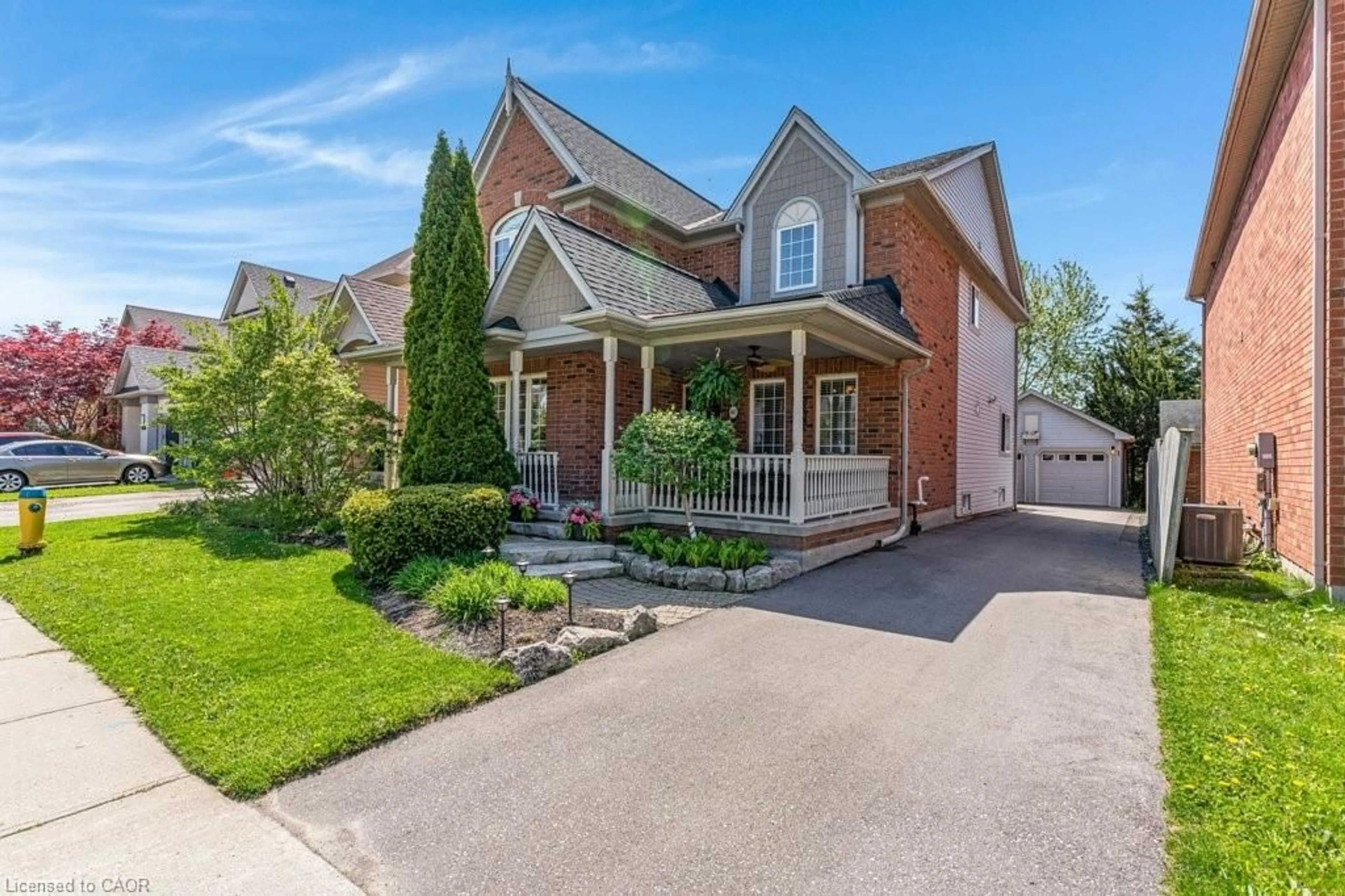 Home with brick exterior material, street for 602 Yarmouth Dr, Waterloo Ontario N2K 4C1