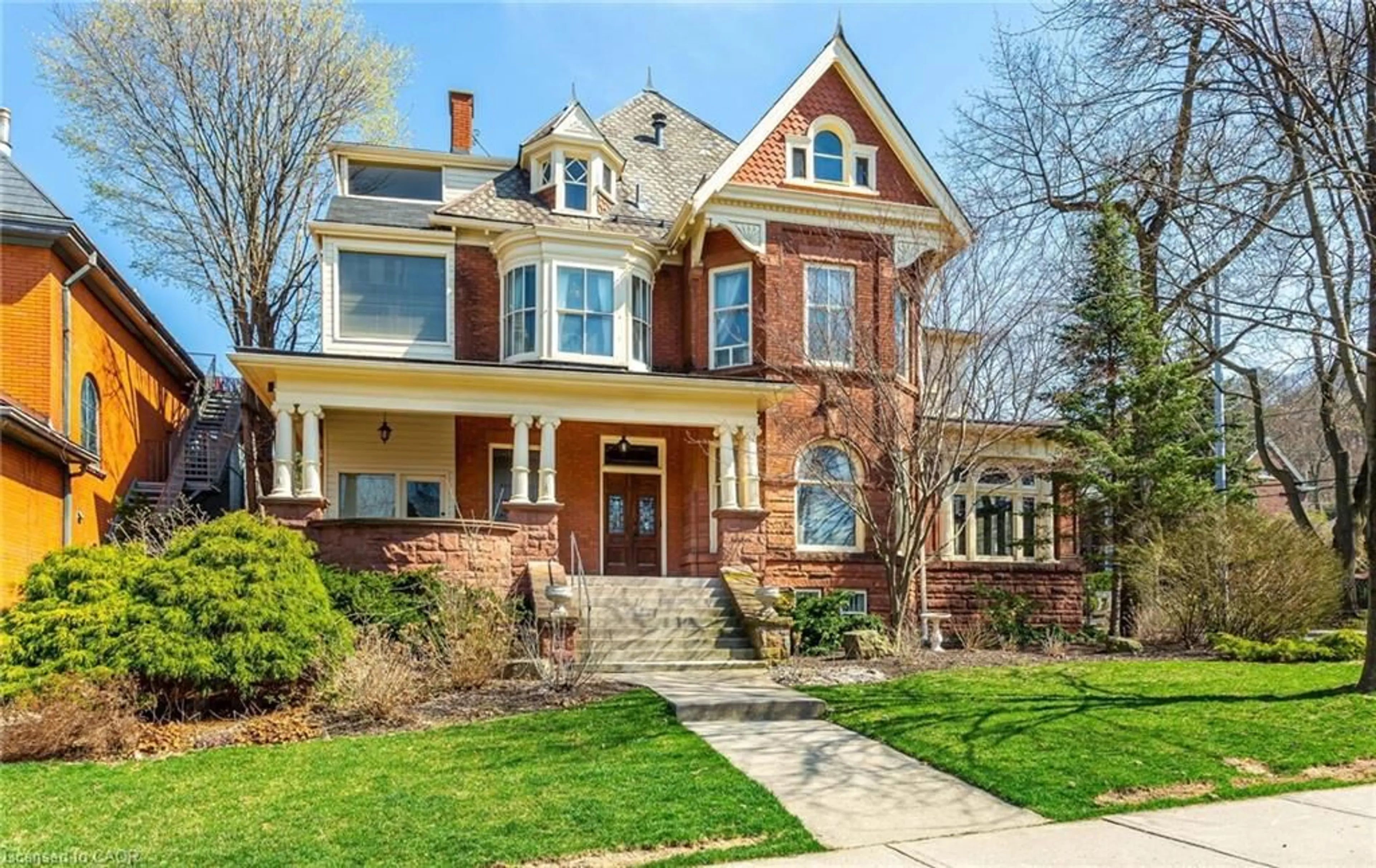 Home with brick exterior material, street for 351-353 Bay St, Hamilton Ontario L8P 3J7