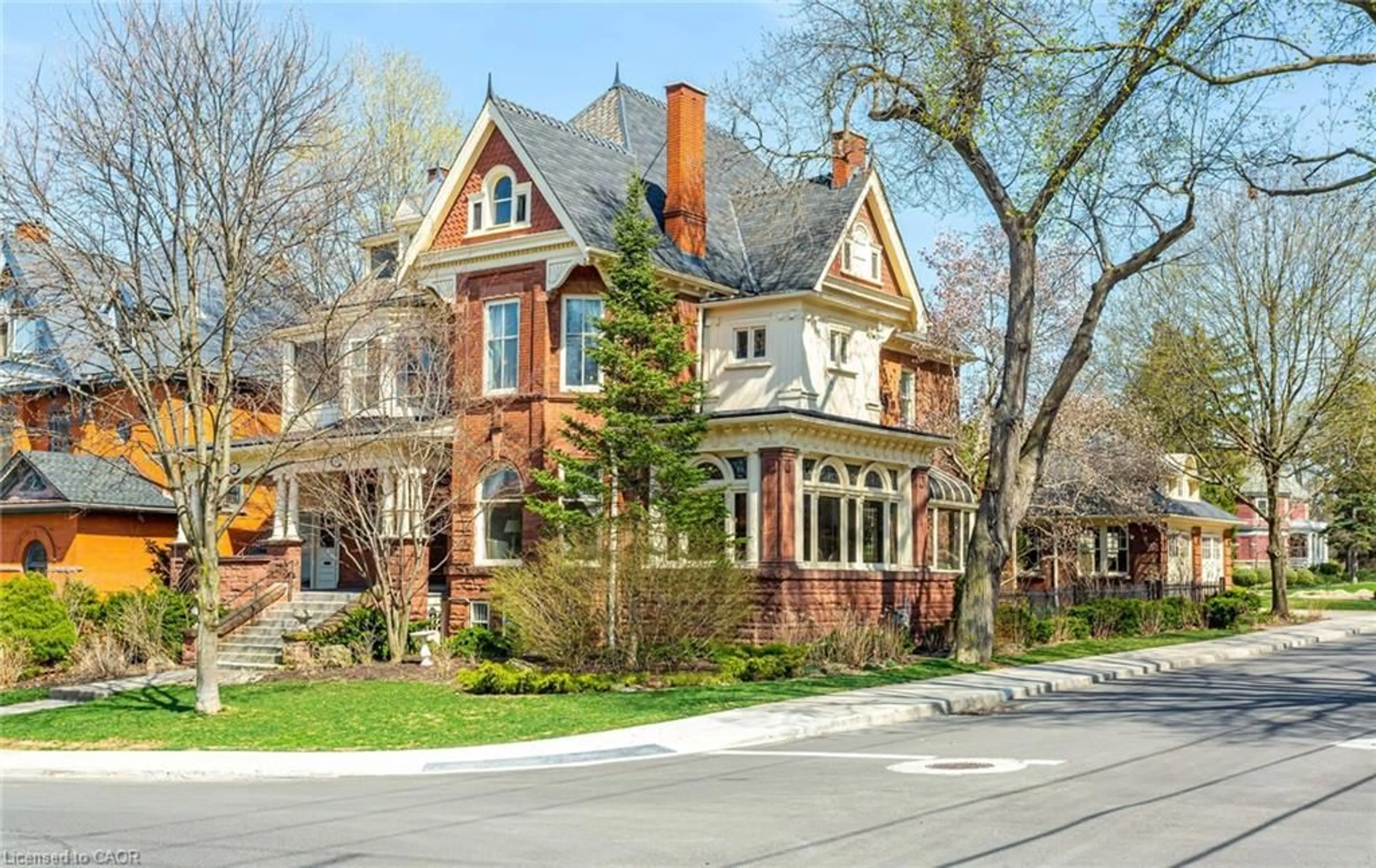 Home with brick exterior material, street for 351-353 Bay St, Hamilton Ontario L8P 3J7