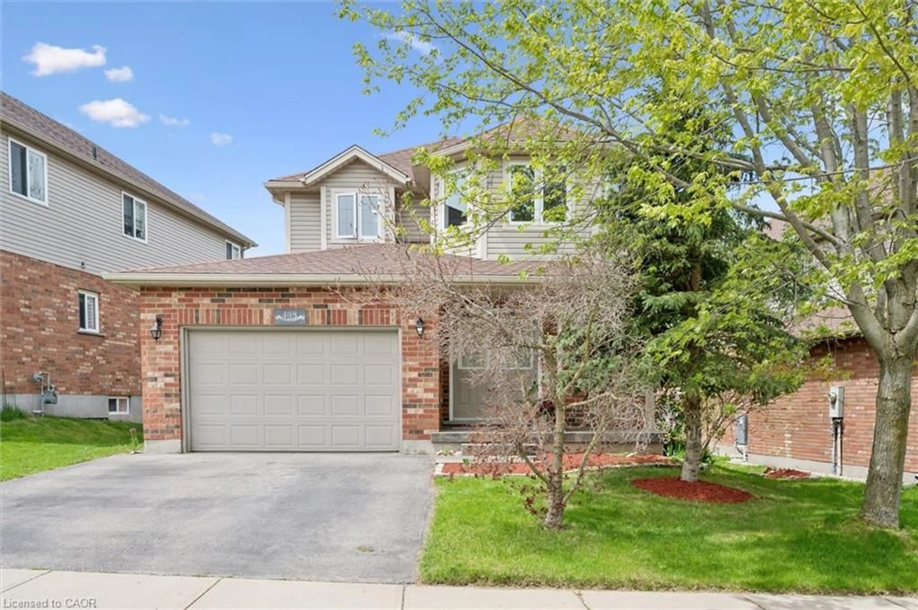 Home with brick exterior material, street for 408 Spice Bush St, Waterloo Ontario N2V 2V6