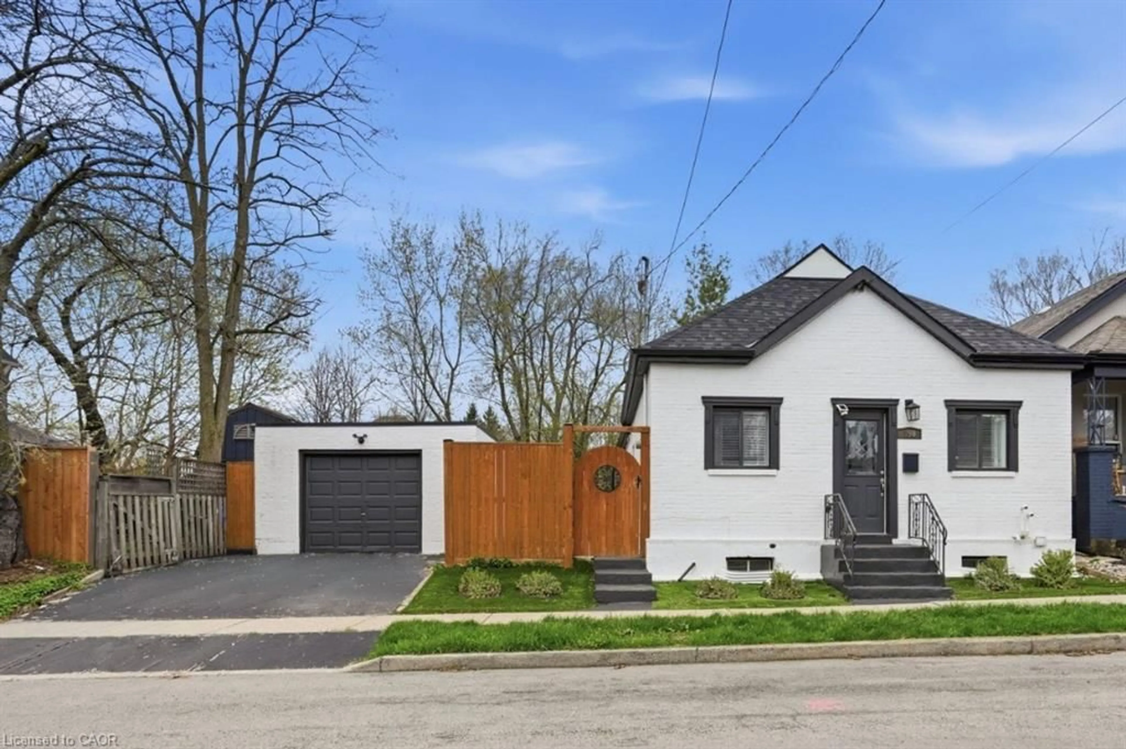 Home with brick exterior material, street for 390 Hunter St, Hamilton Ontario L8P 1S9