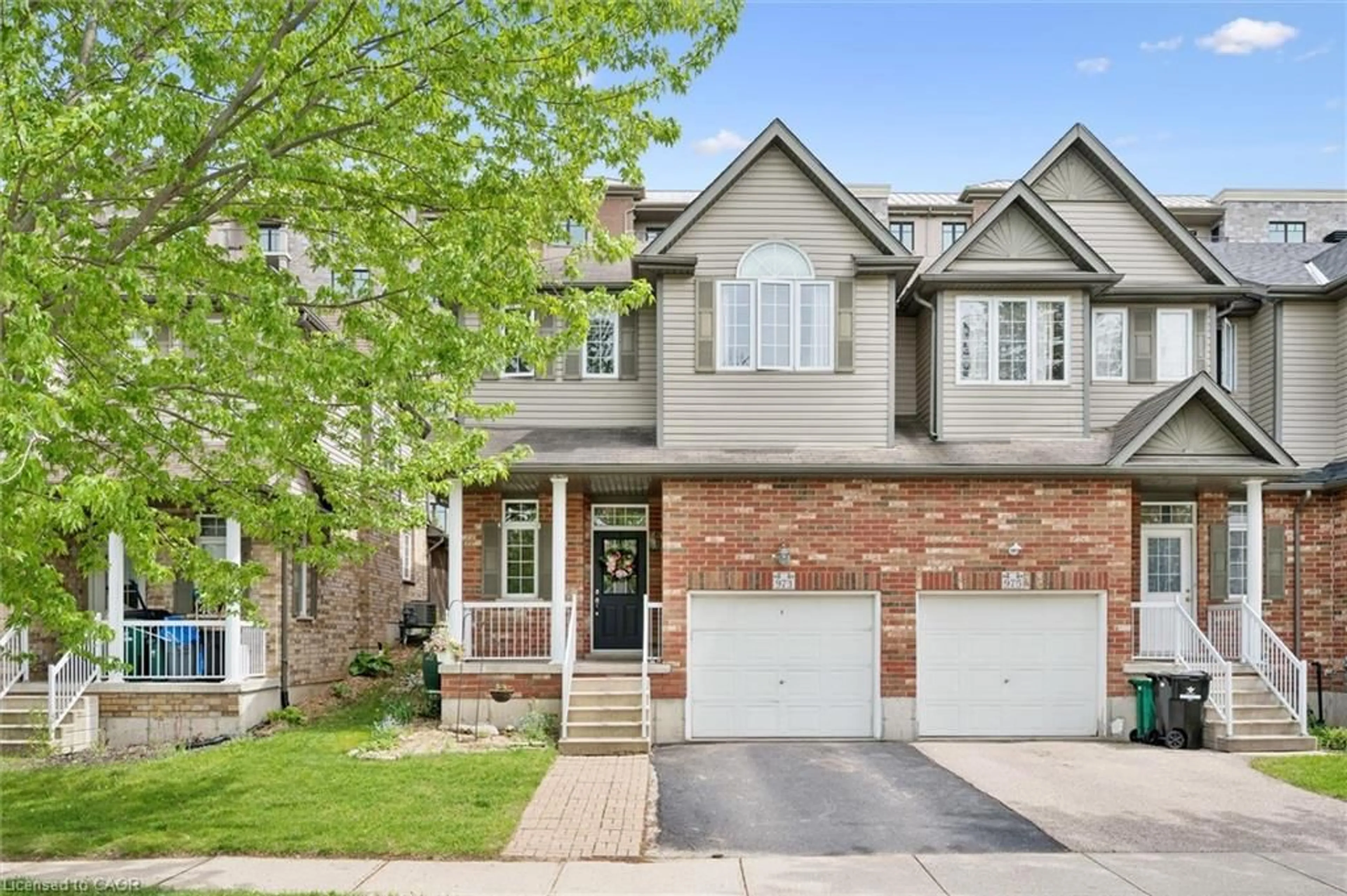 Home with brick exterior material, street for 973 Creekside Dr, Waterloo Ontario N2V 2W5