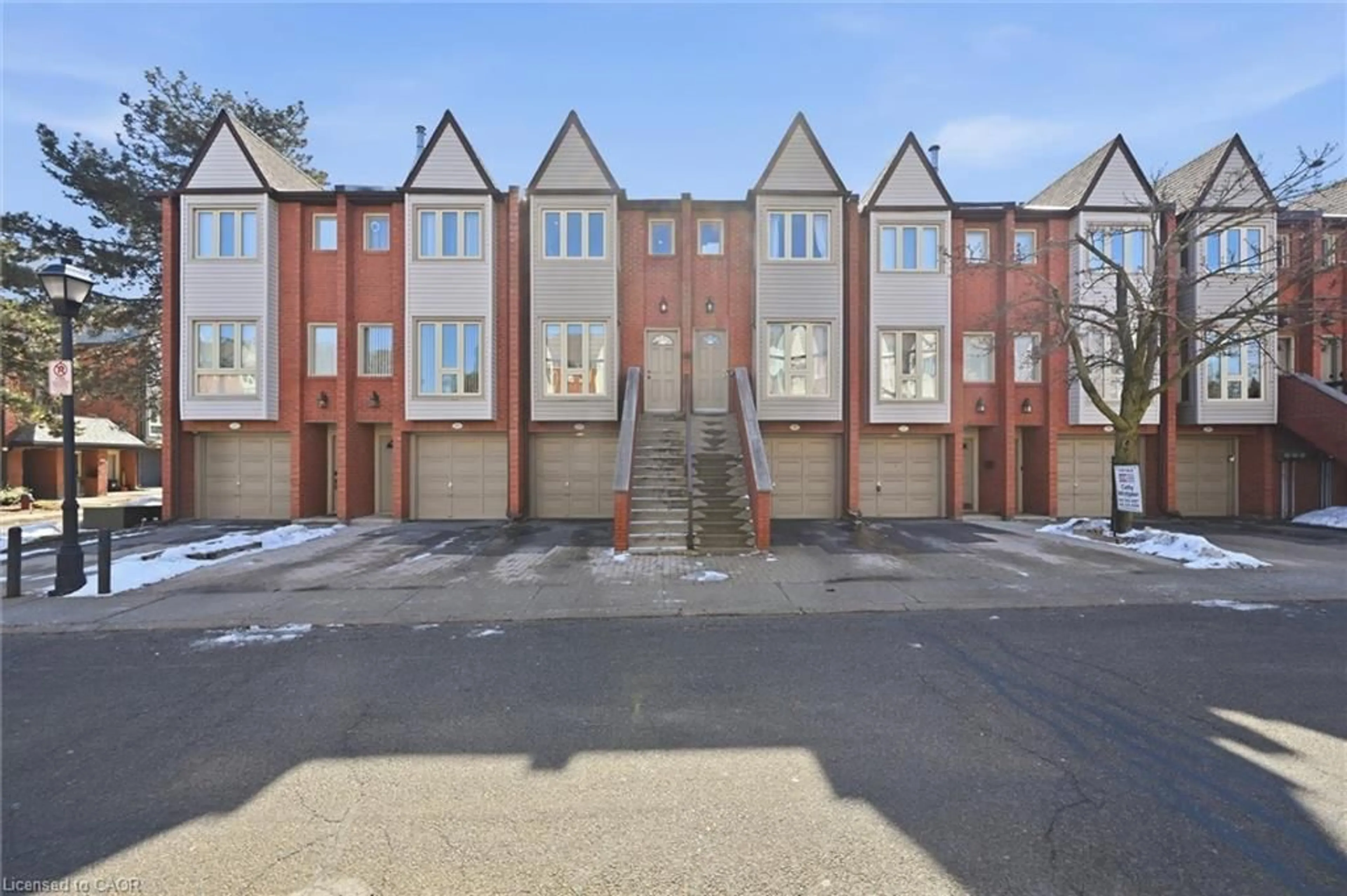 A pic from outside/outdoor area/front of a property/back of a property/a pic from drone, street for 895 Maple Ave #215, Burlington Ontario L7S 2H7