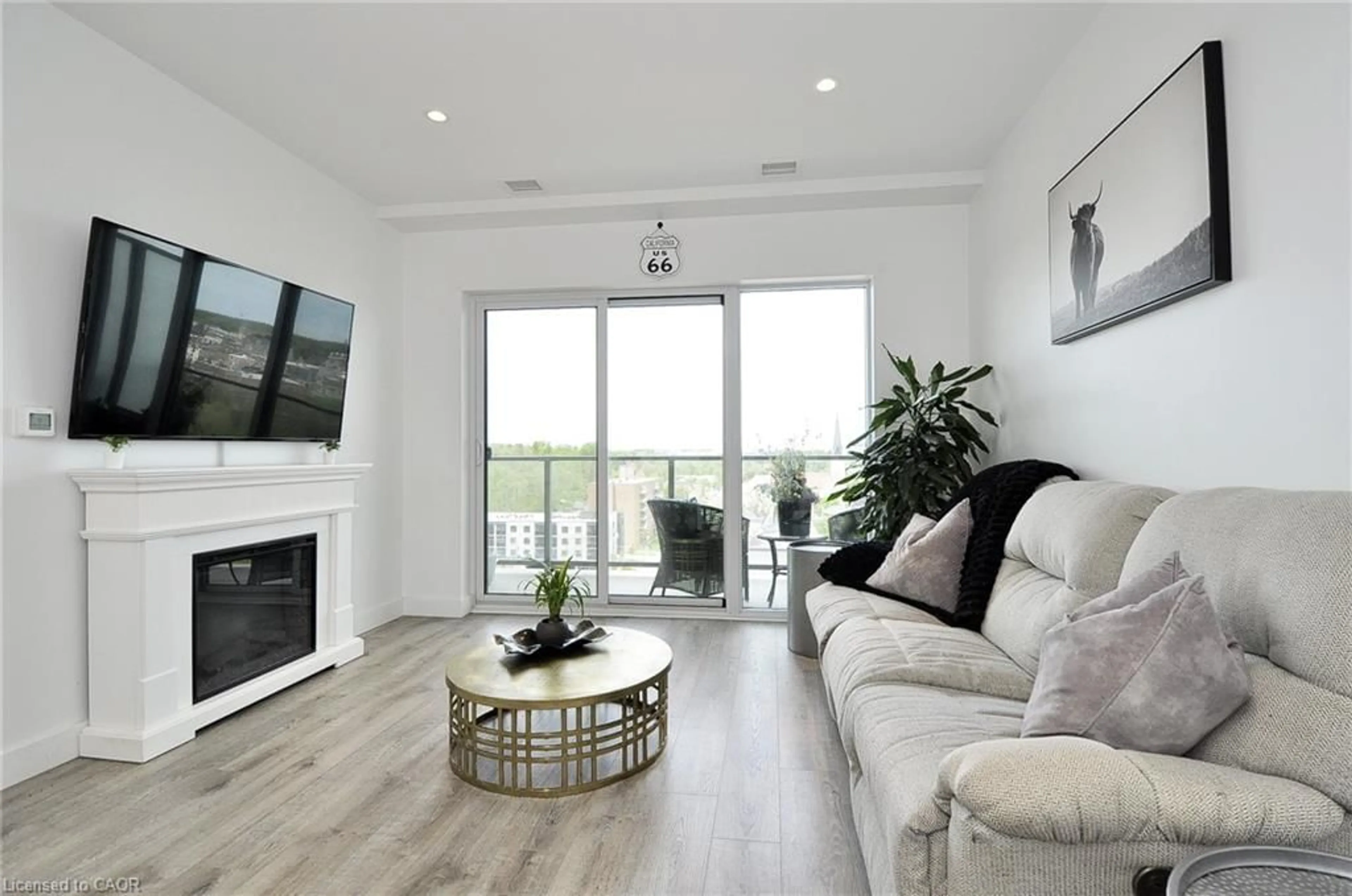 Living room with furniture, wood/laminate floor for 50 Grand Ave #903, Cambridge Ontario N1S 0C2