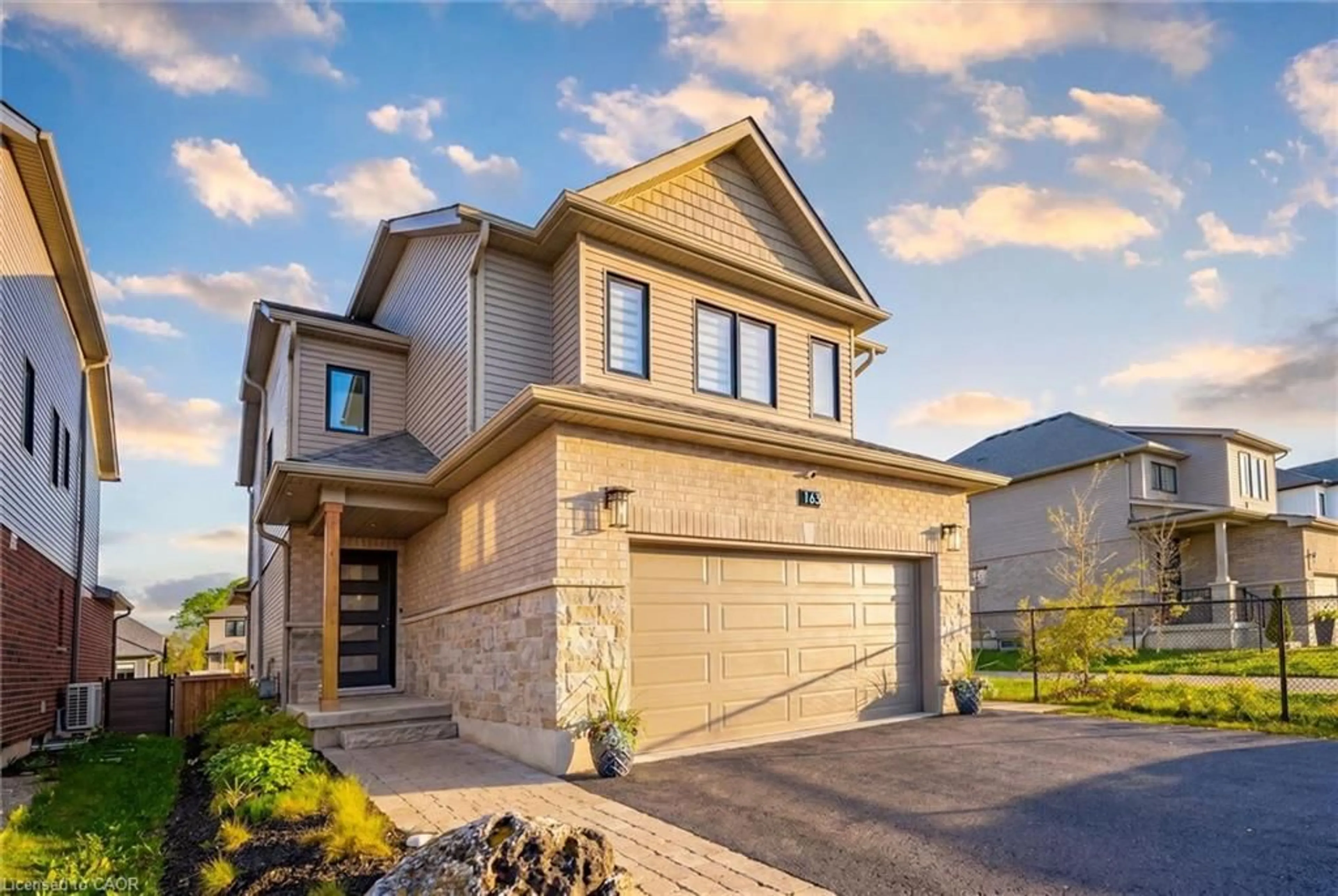 Home with brick exterior material, street for 163 Halls Dr, Elora Ontario N0B 1S0