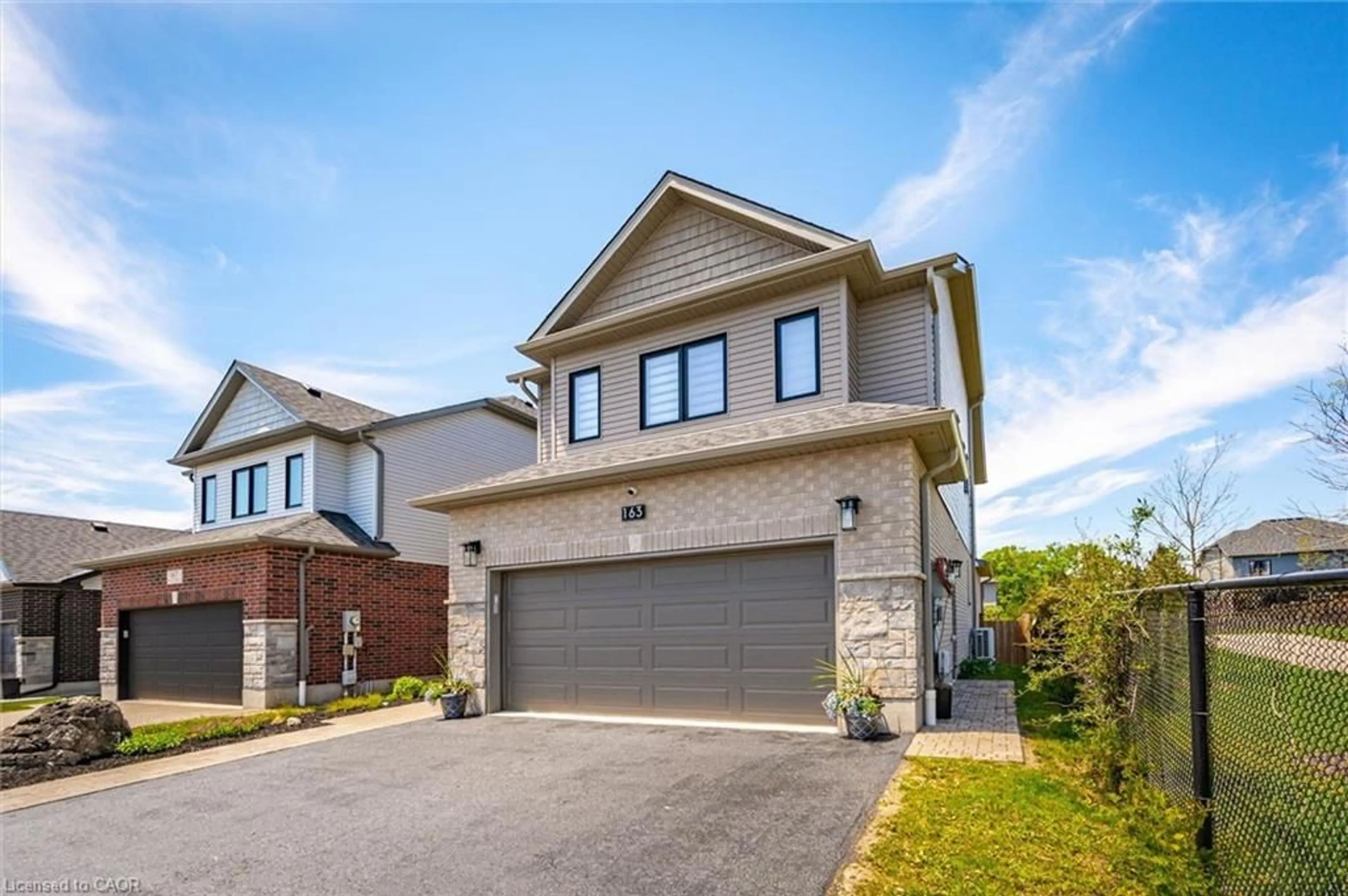 Home with brick exterior material, street for 163 Halls Dr, Elora Ontario N0B 1S0