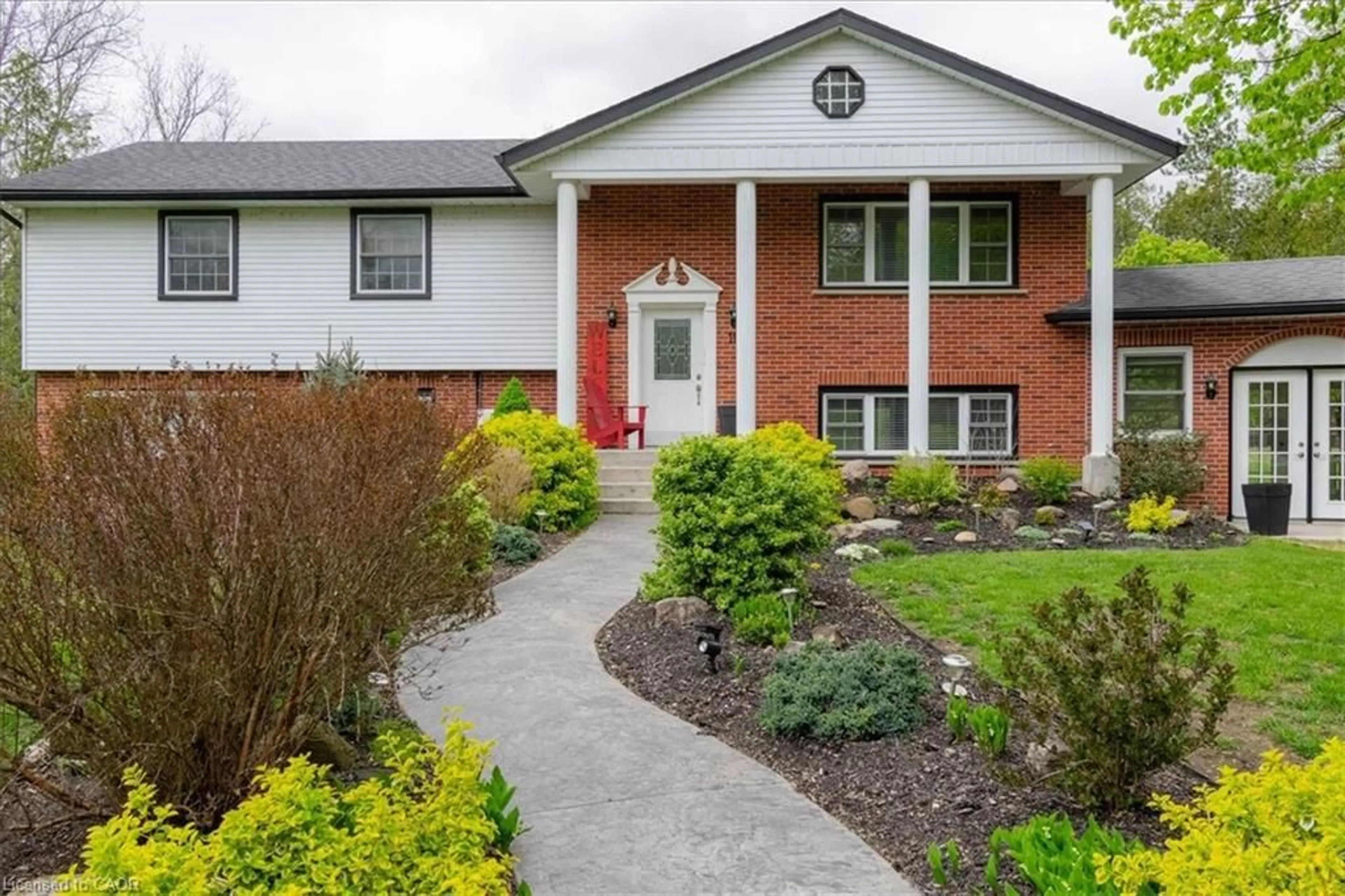 Home with brick exterior material, street for 111 Decou Rd, Simcoe Ontario N3Y 4K2