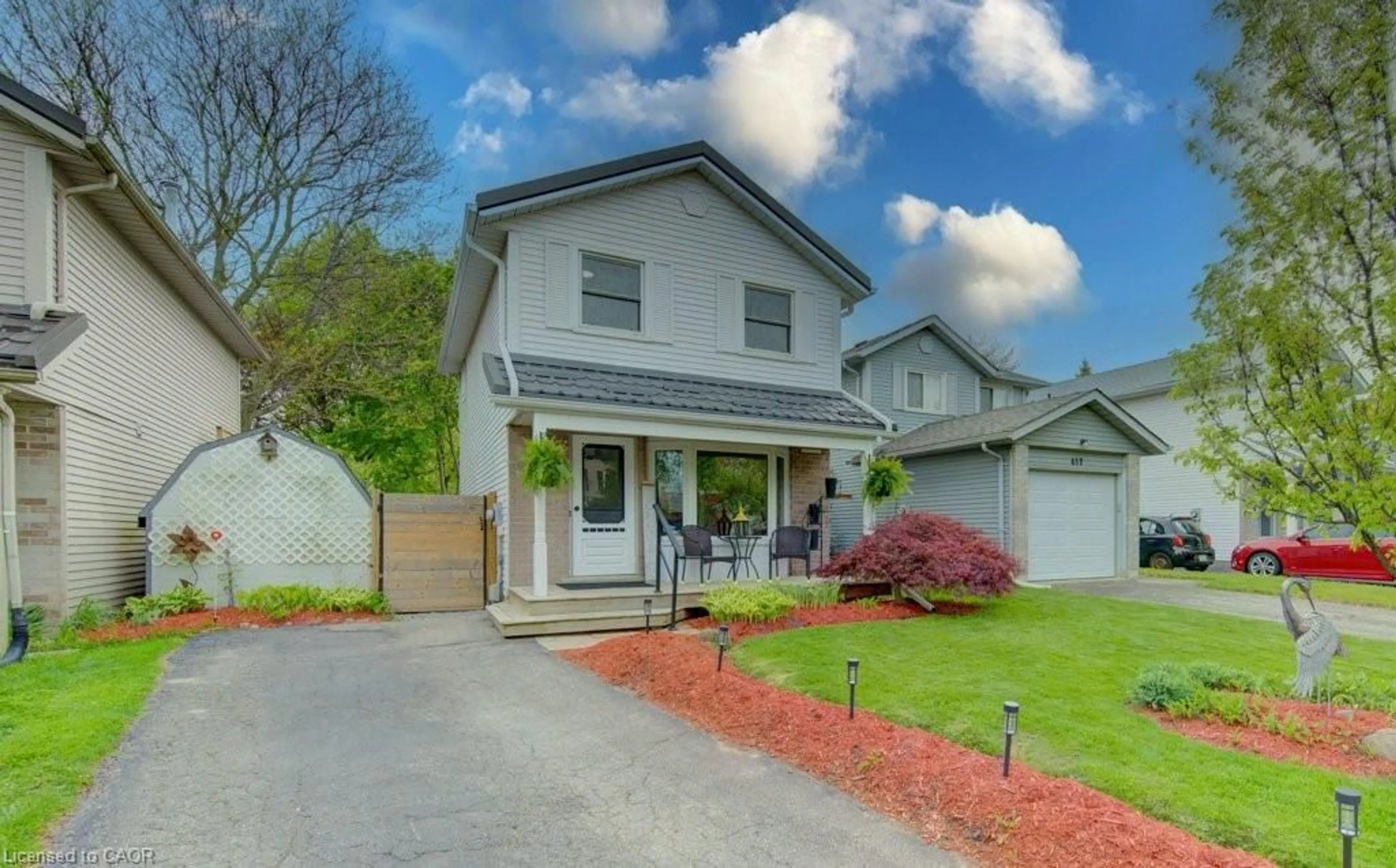 Home with vinyl exterior material, street for 455 Boettger Pl, Waterloo Ontario N2K 3N5