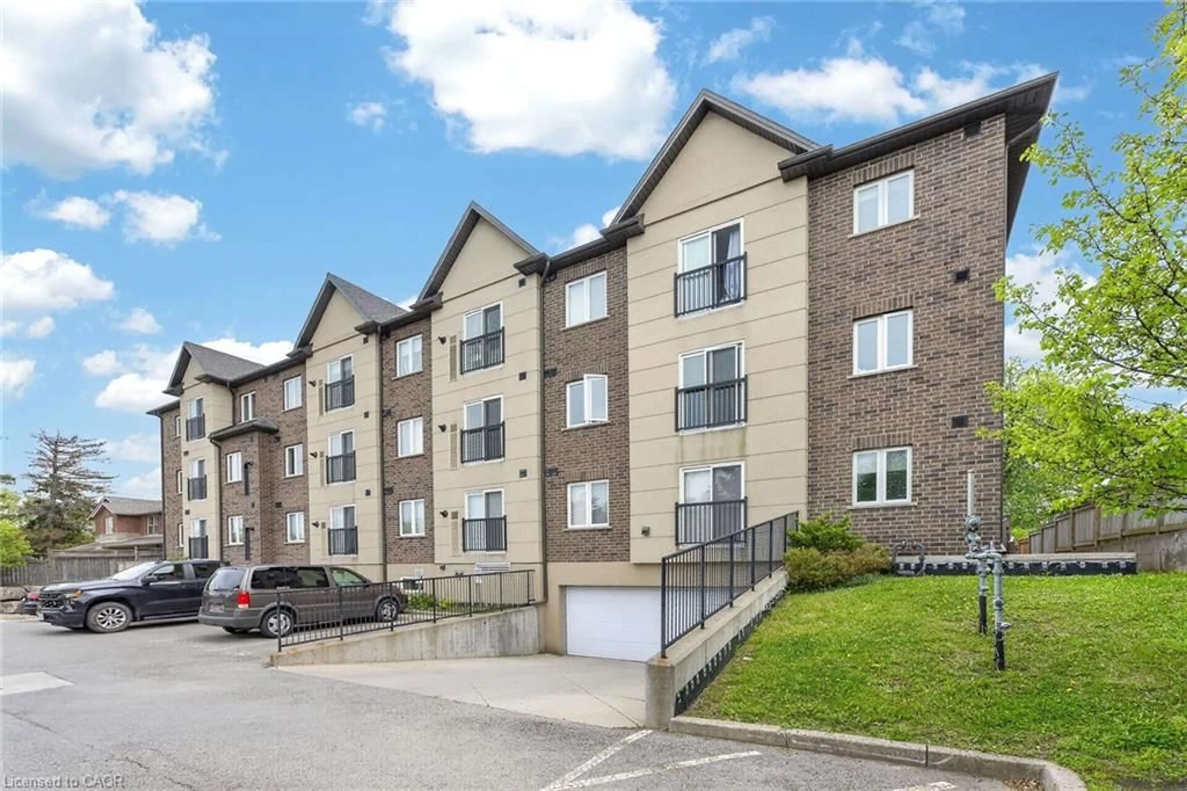 A pic from outside/outdoor area/front of a property/back of a property/a pic from drone, street for 886 Golf Links Rd #204, Ancaster Ontario L9K 1J8
