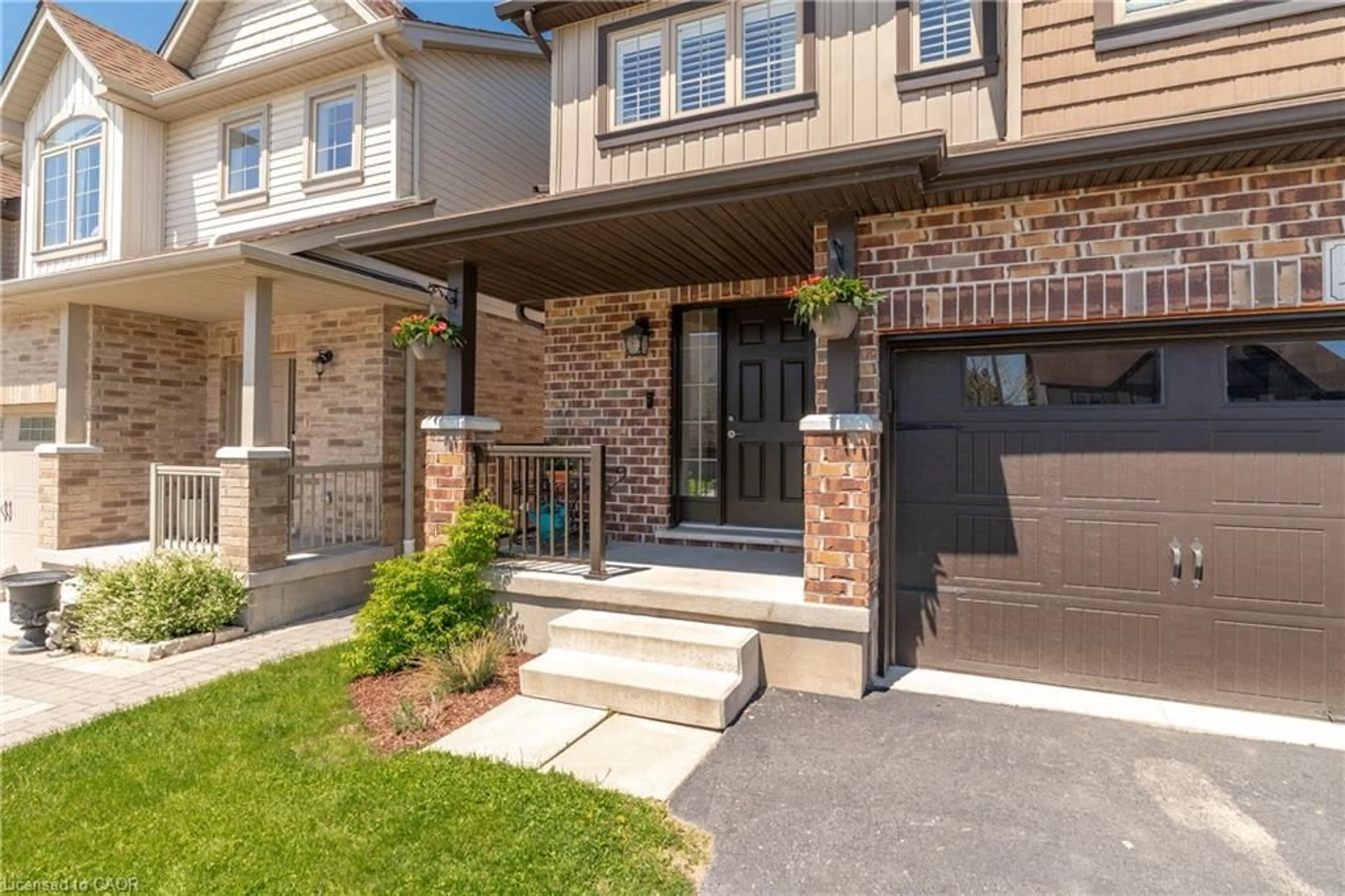 Home with brick exterior material, street for 141 Couling Cres, Guelph Ontario N1E 0K9