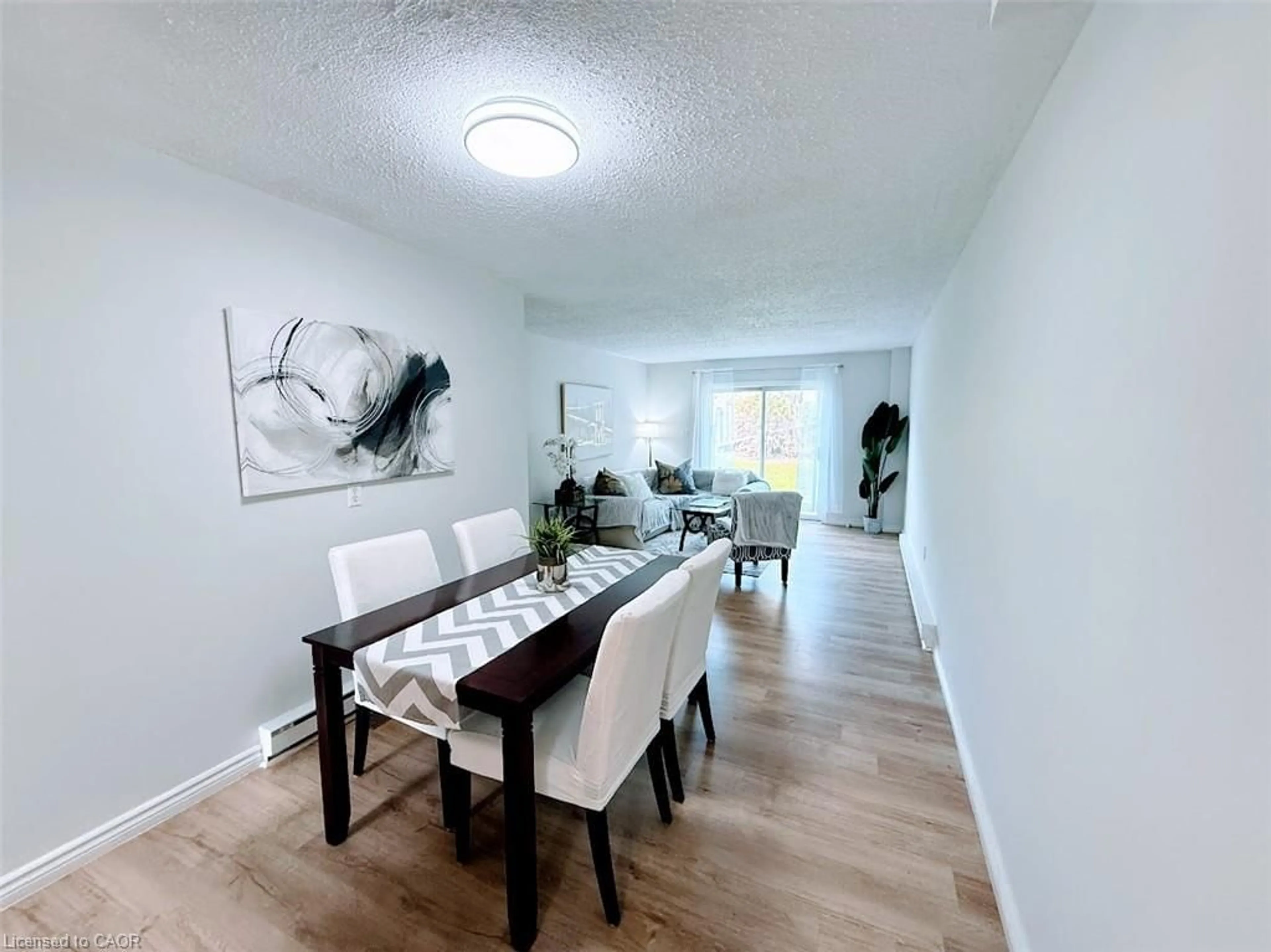 Dining room, wood/laminate floor for 515 Weber St #G, Waterloo Ontario N2L 4G1