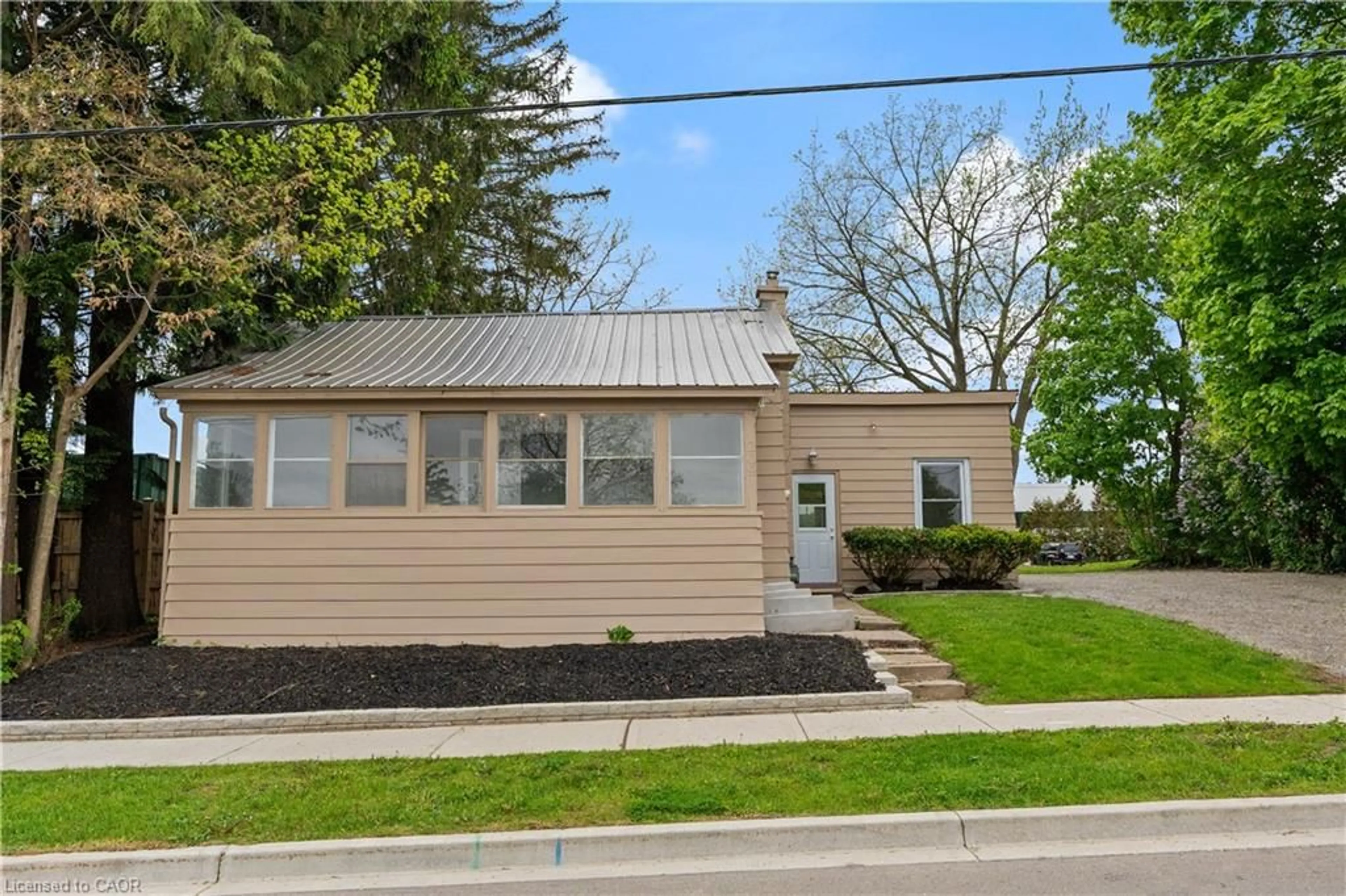 Home with vinyl exterior material, street for 209 St Andrew St, Port Dover Ontario N0A 1N0