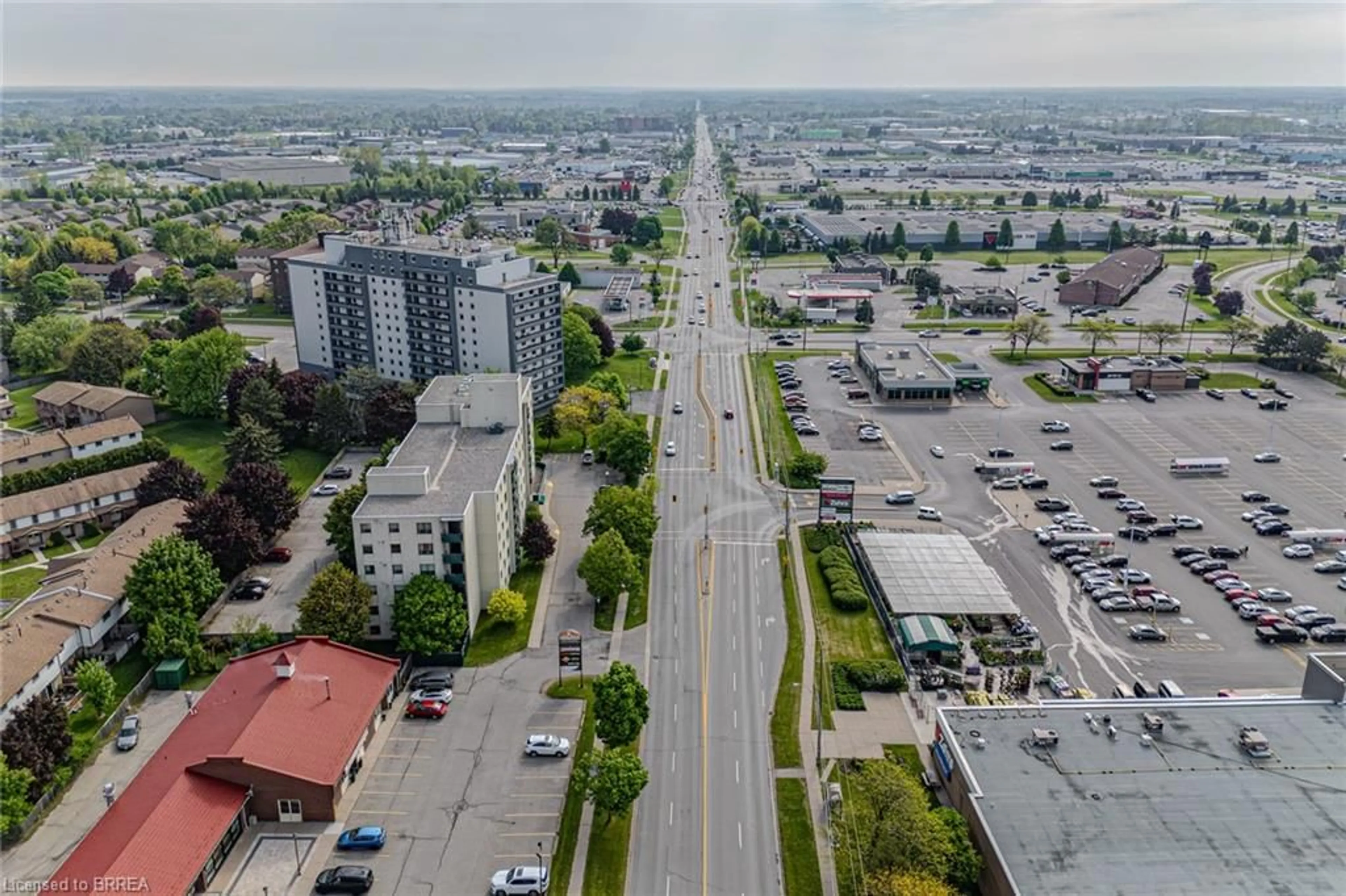 A pic from outside/outdoor area/front of a property/back of a property/a pic from drone, street for 421 Fairview Dr #301, Brantford Ontario N3R 7M3