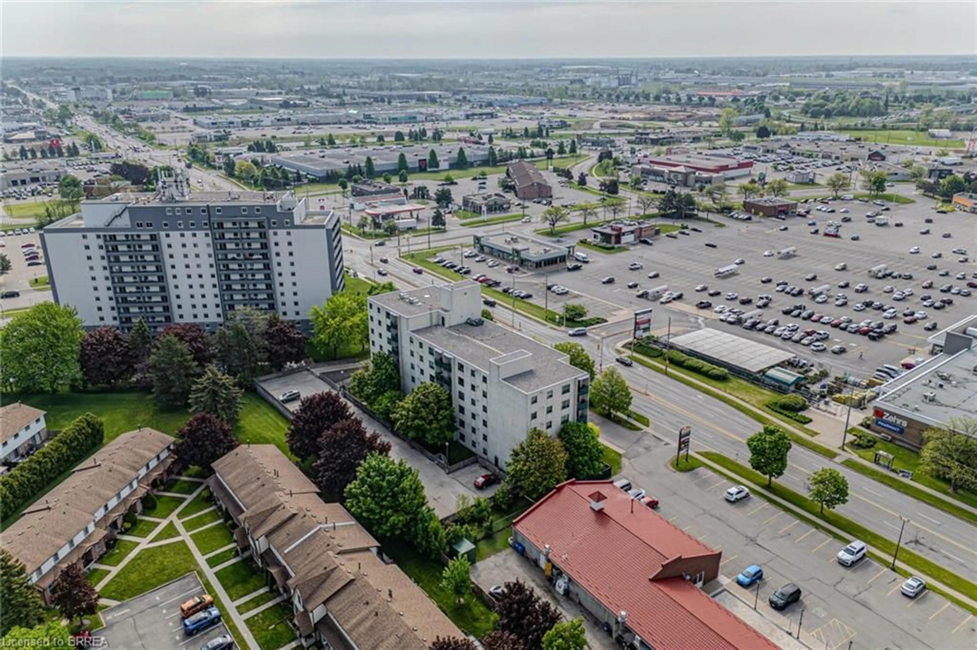 A pic from outside/outdoor area/front of a property/back of a property/a pic from drone, city buildings view from balcony for 421 Fairview Dr #301, Brantford Ontario N3R 7M3