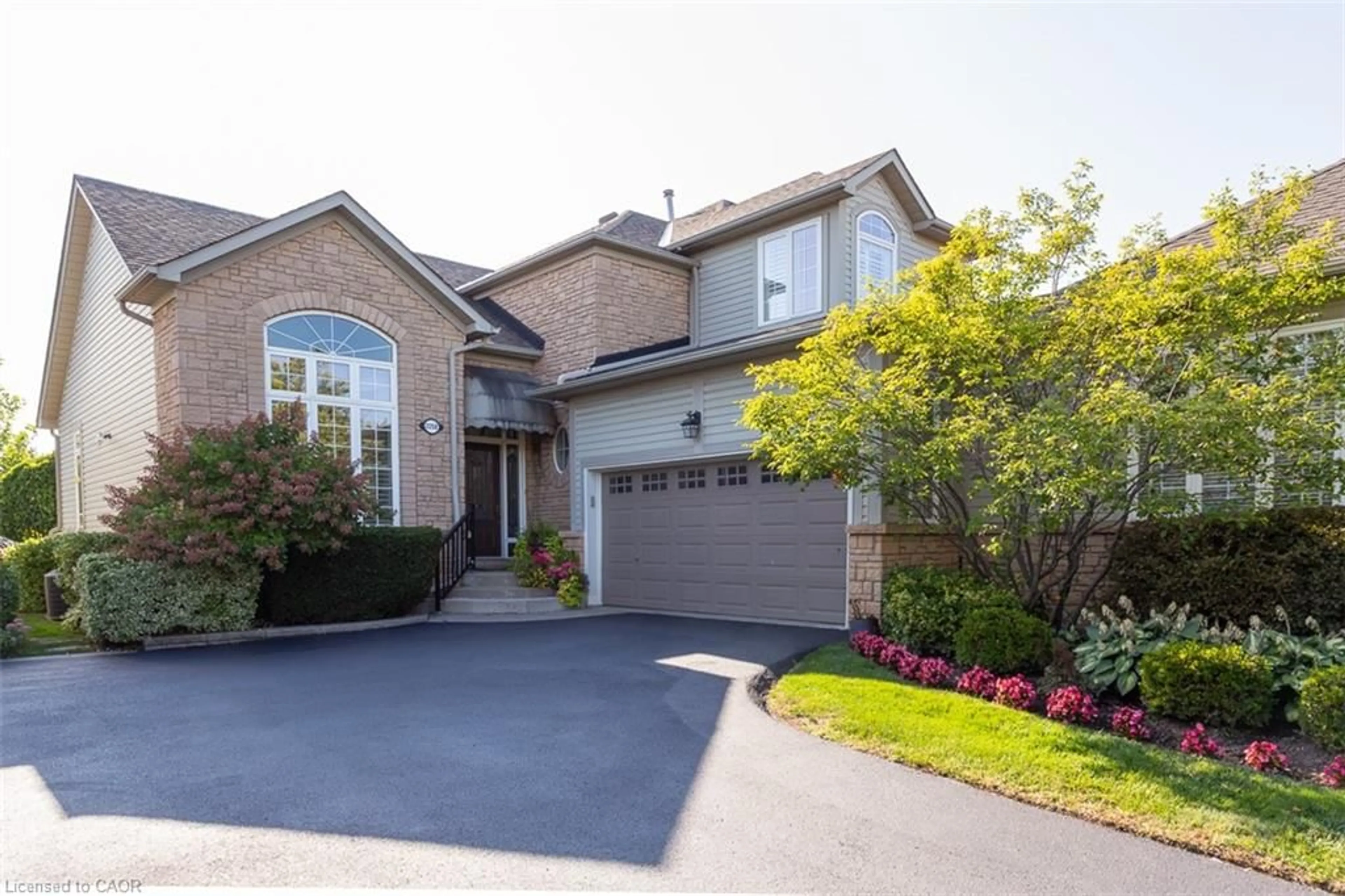 Home with brick exterior material, street for 2258 Turnberry Rd, Burlington Ontario L7M 4S6