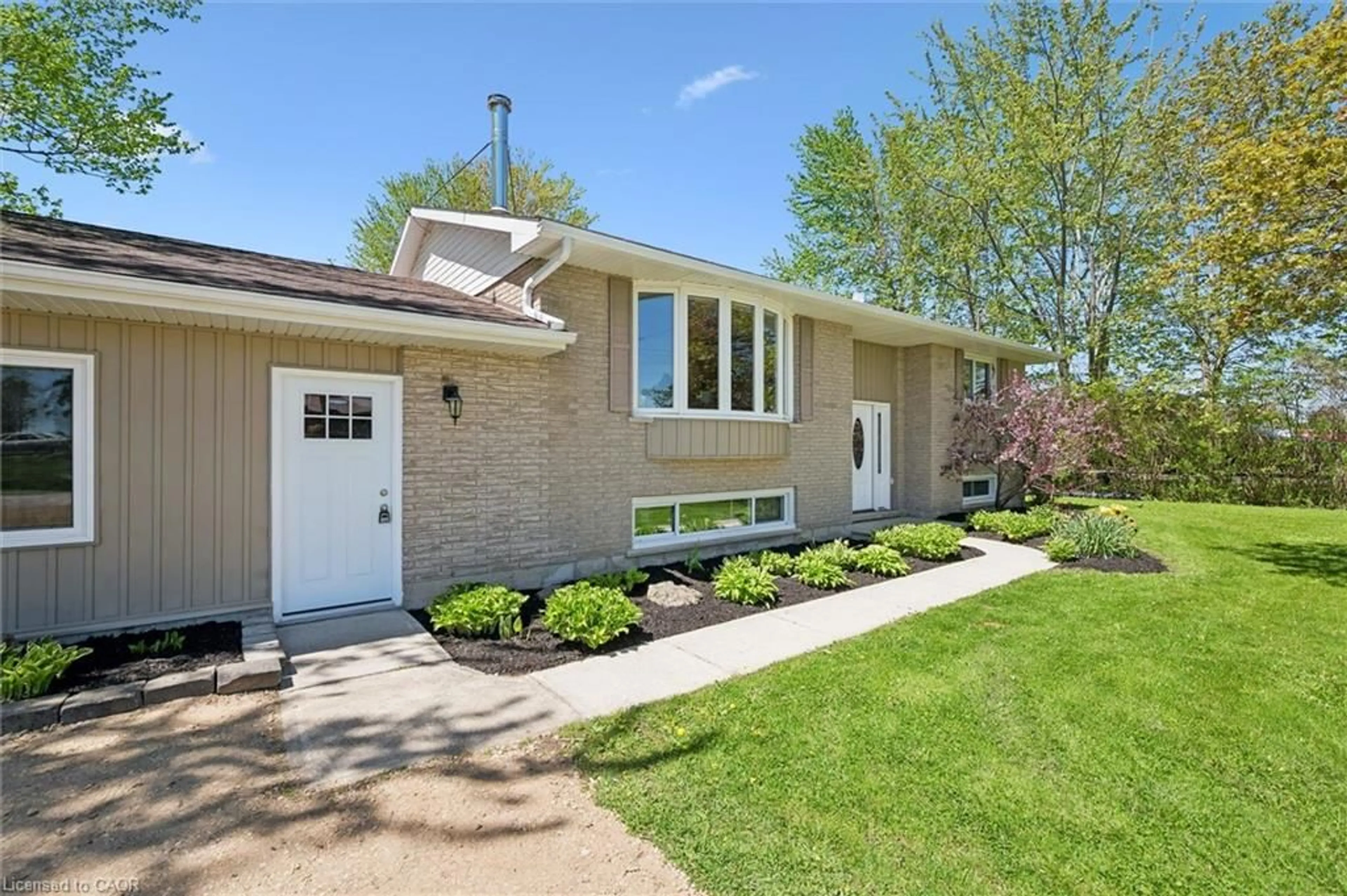 Home with brick exterior material, street for 4 Macdonald St, Elora Ontario N0B 1S0