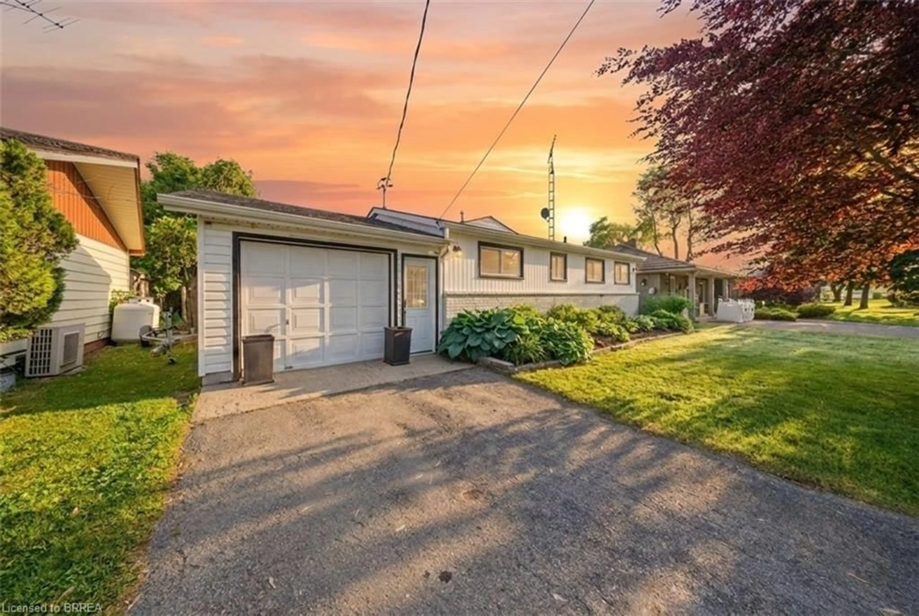 A pic from outside/outdoor area/front of a property/back of a property/a pic from drone, street for 382 Cedar Dr, Turkey Point Ontario N0E 1T0