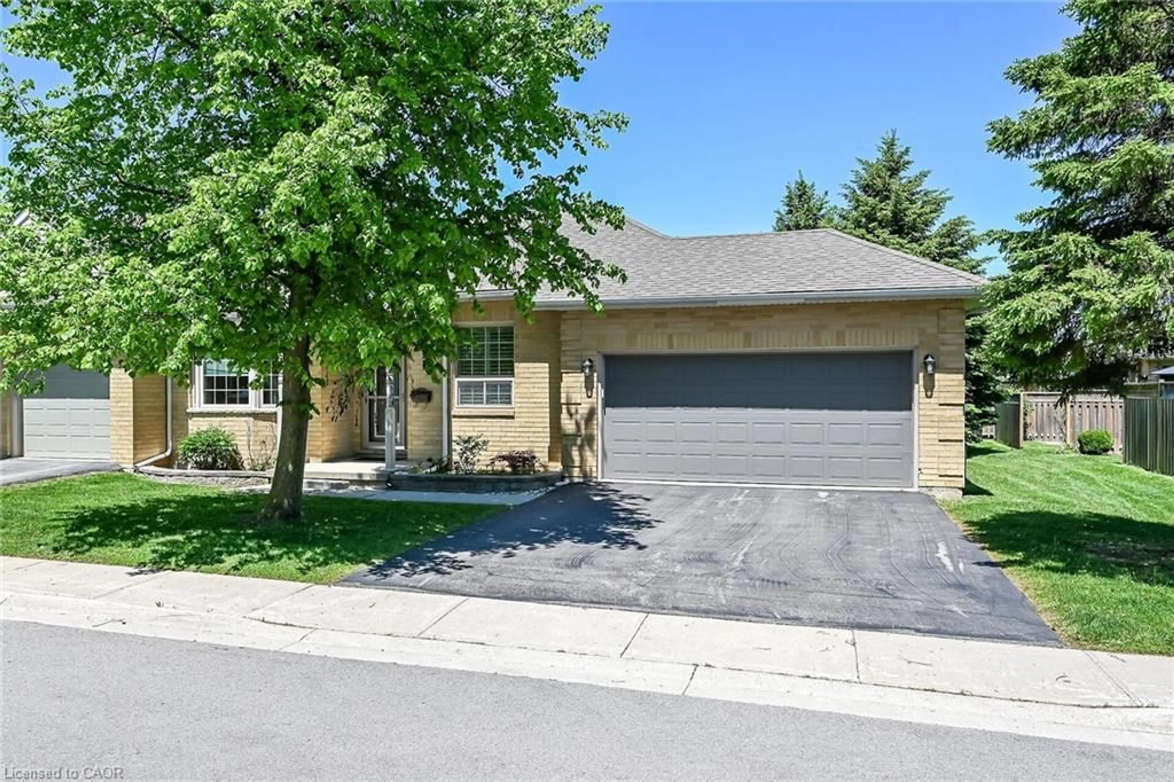 Home with brick exterior material, street for 44 Riveroaks Dr, Mount Hope Ontario L0R 1W0