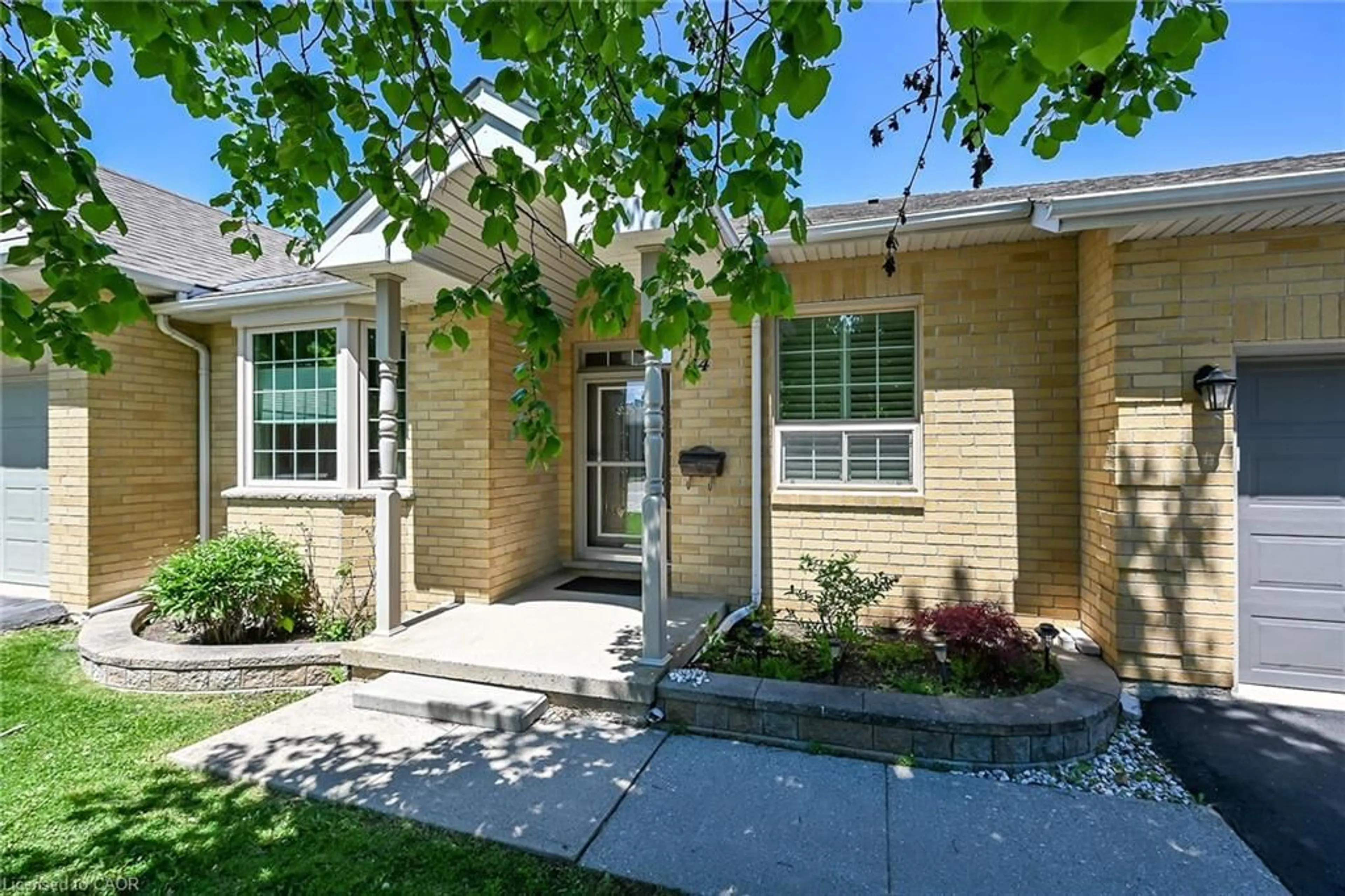 Home with brick exterior material, street for 44 Riveroaks Dr, Mount Hope Ontario L0R 1W0