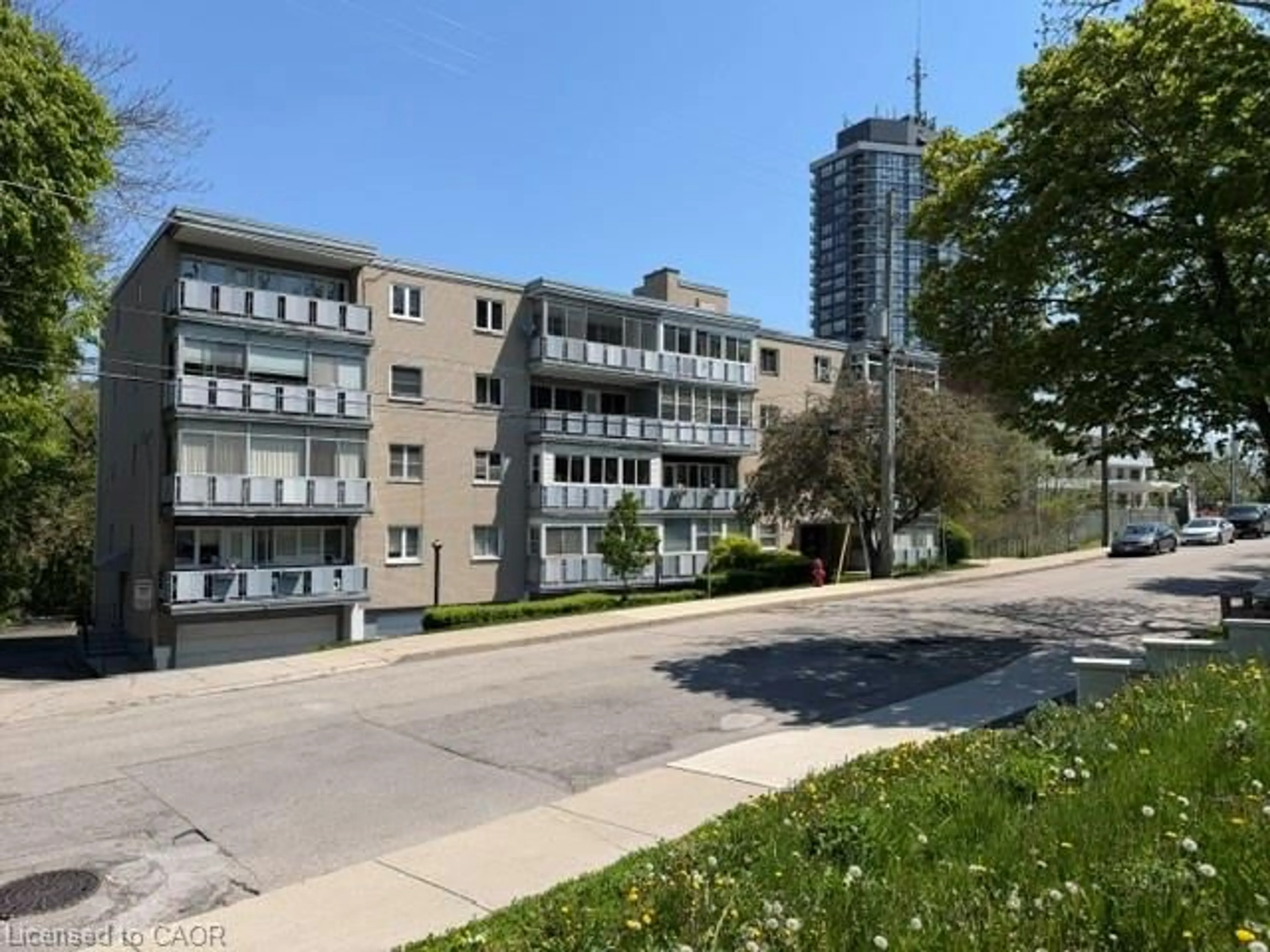 A pic from outside/outdoor area/front of a property/back of a property/a pic from drone, unknown for 107 St. Joseph's Dr #404, Hamilton Ontario L8N 2G1