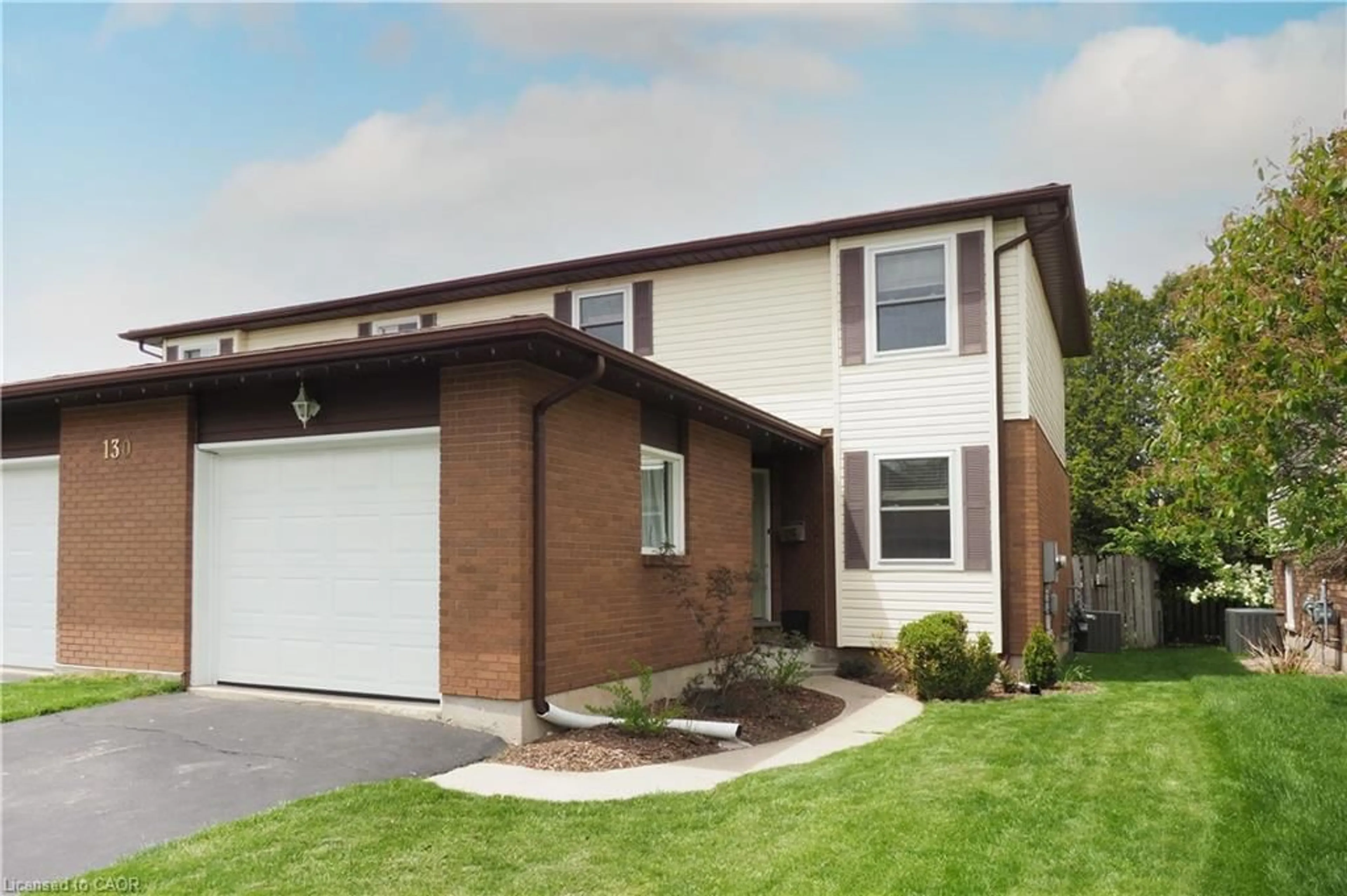 Home with vinyl exterior material, street for 130A Miller Cres, Palmerston Ontario N0G 2P0