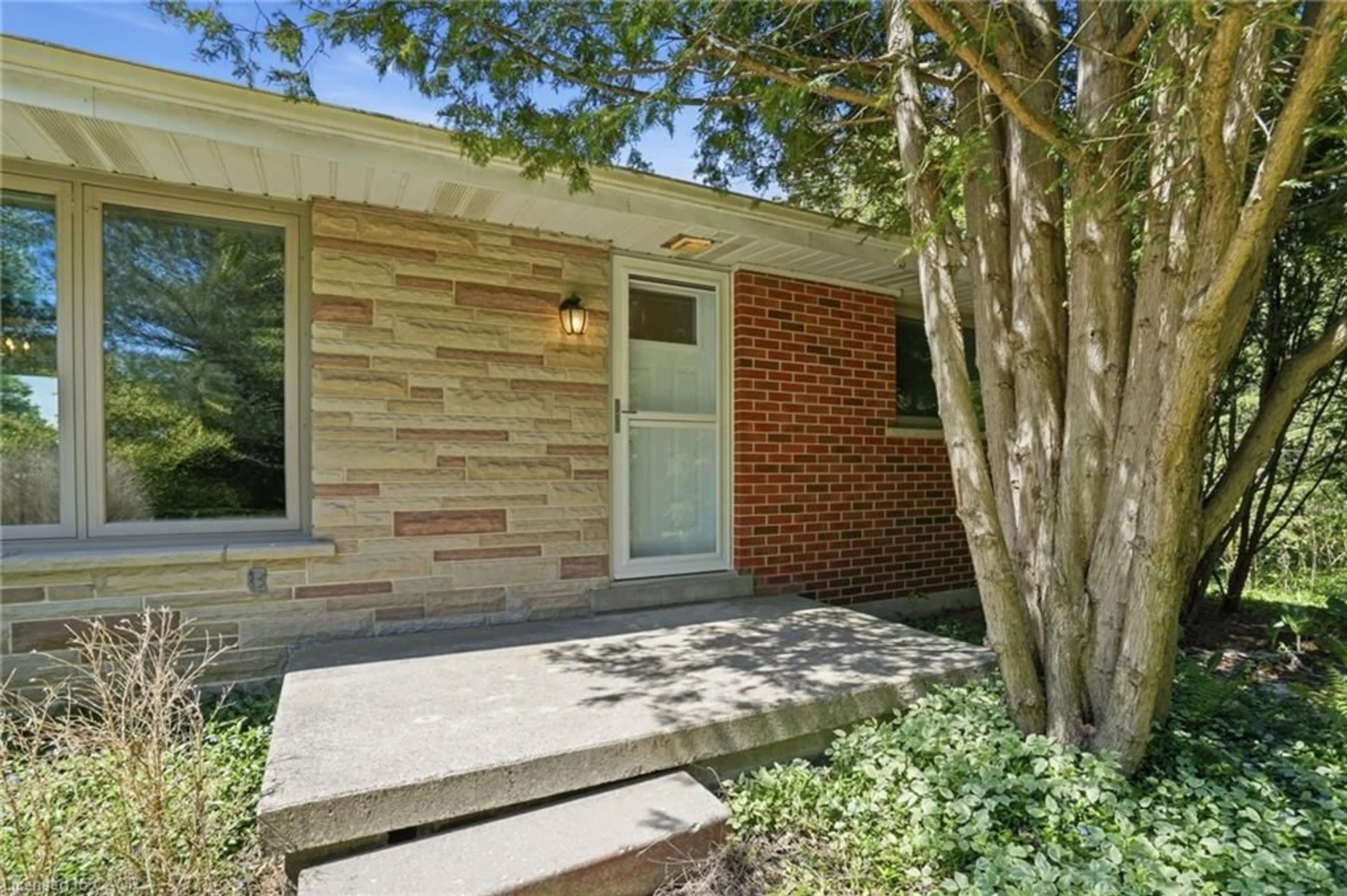 Home with brick exterior material, street for 1961 Centre Rd, Hamilton Ontario L9N 2Z7