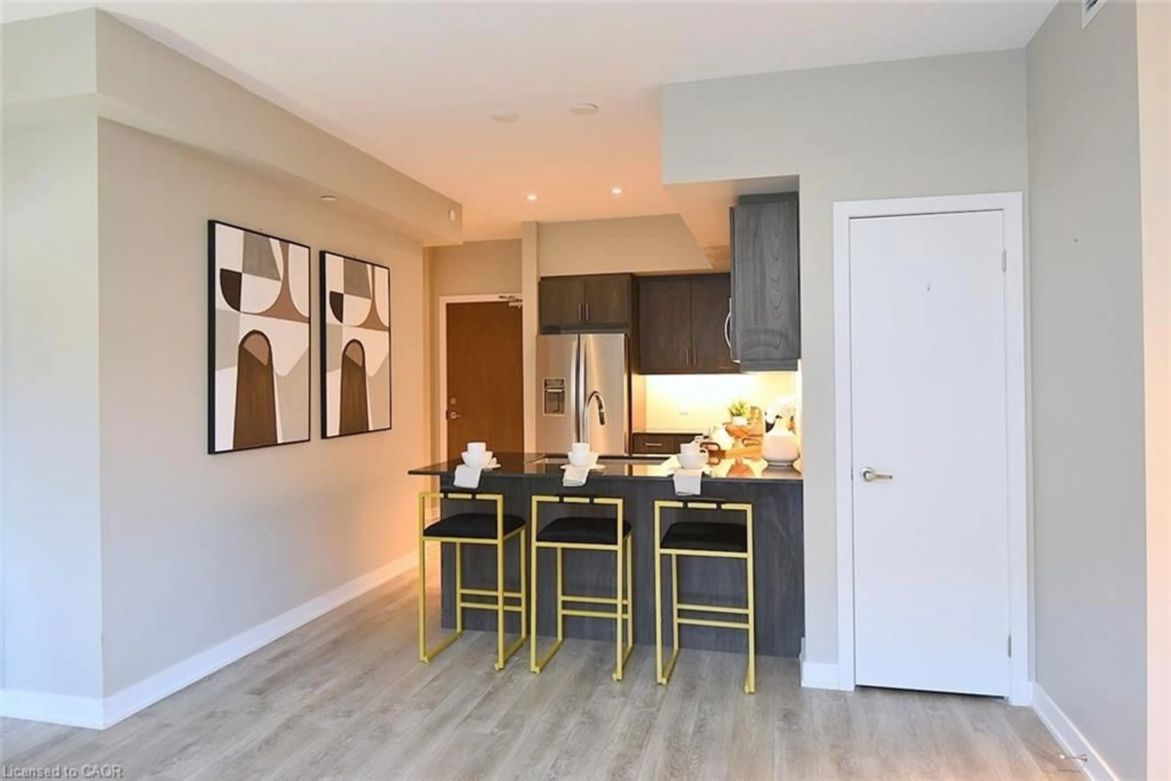 Open concept kitchen, wood/laminate floor for 16 Markle Cres #111, Ancaster Ontario L9G 0H4