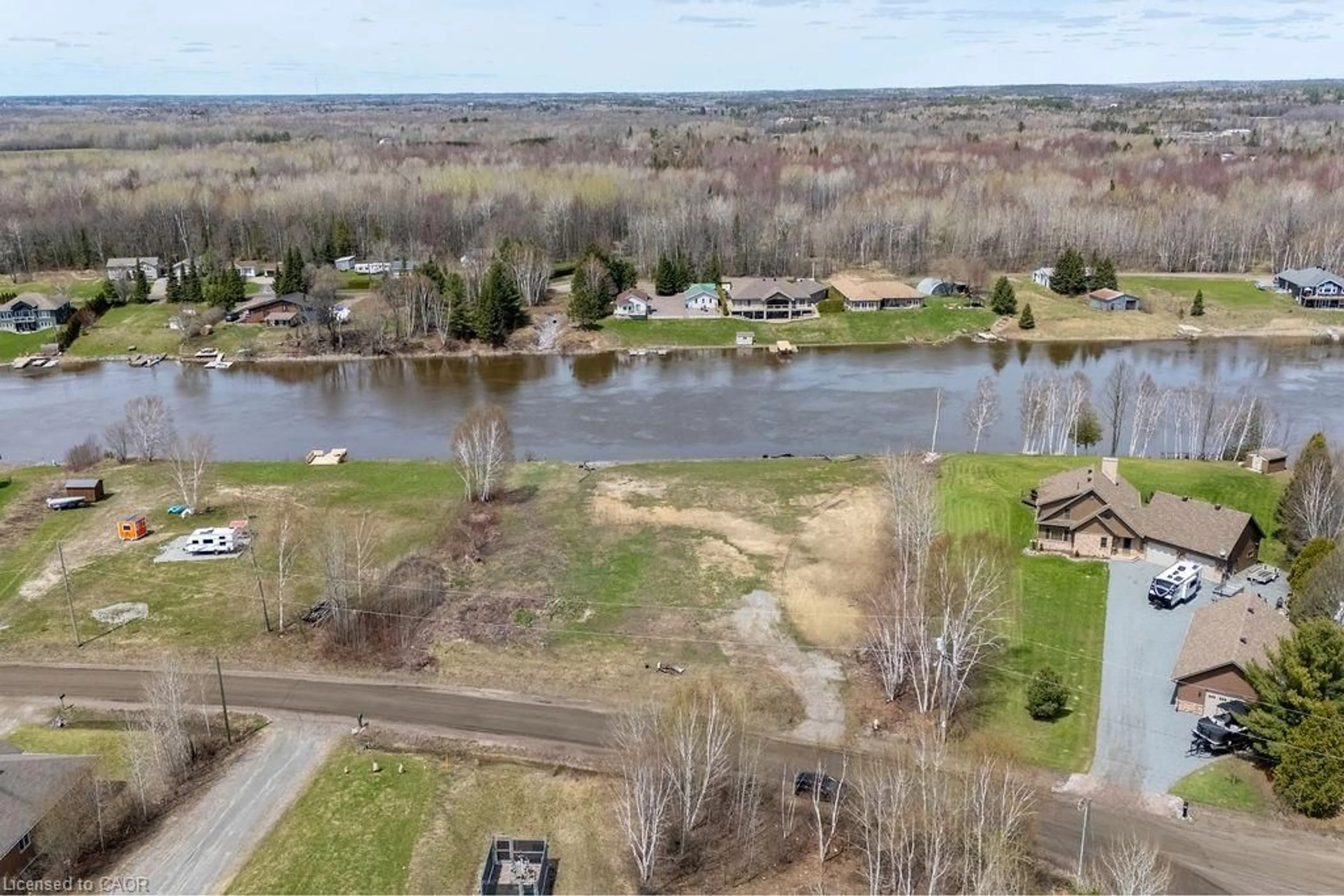 A pic from outside/outdoor area/front of a property/back of a property/a pic from drone, water/lake/river/ocean view for 515 Champagne Rd, Sturgeon Falls Ontario P2B 2L9