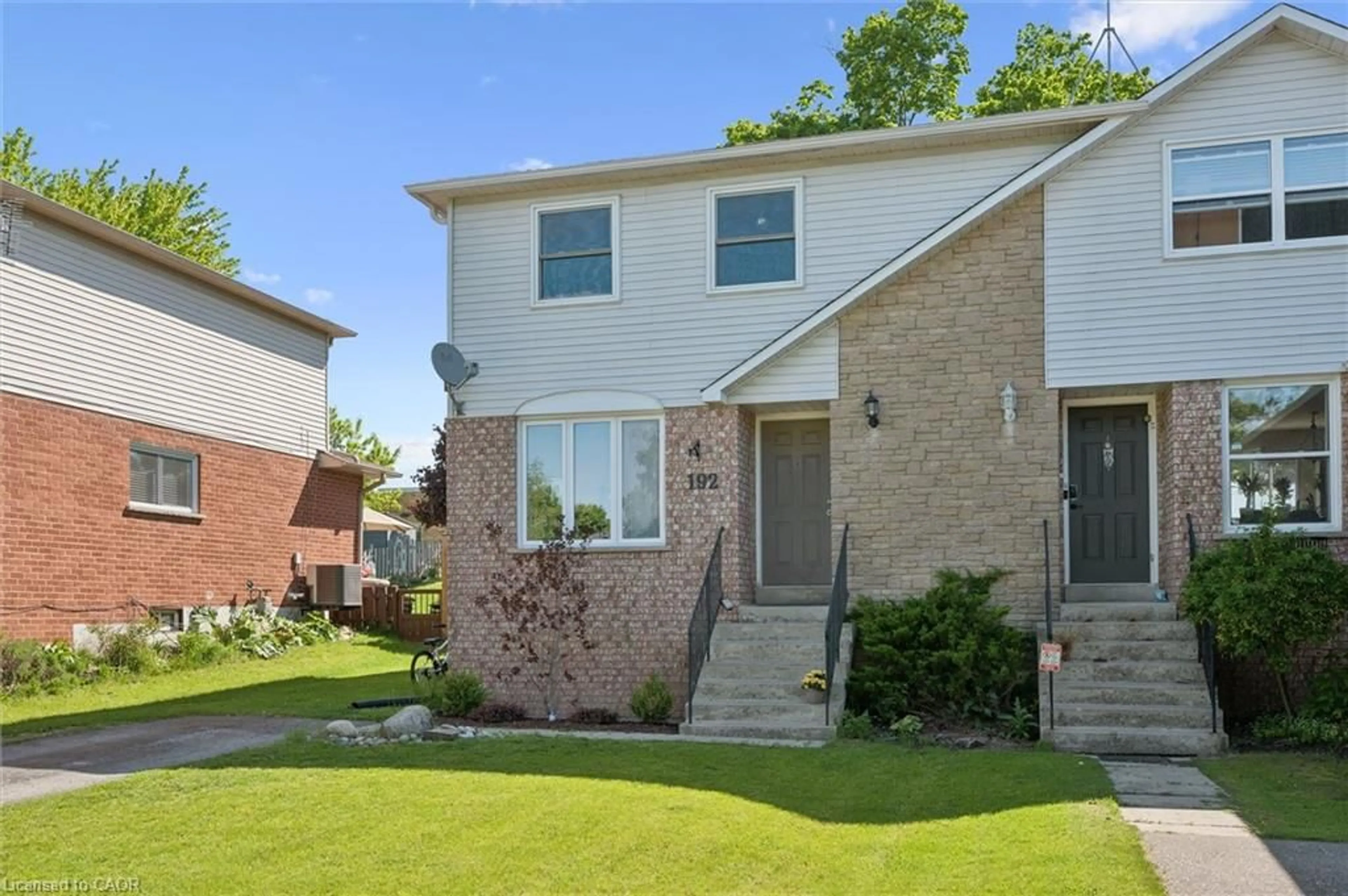 Home with brick exterior material, street for 192 Nith River Way, Ayr Ontario N0B 1E0