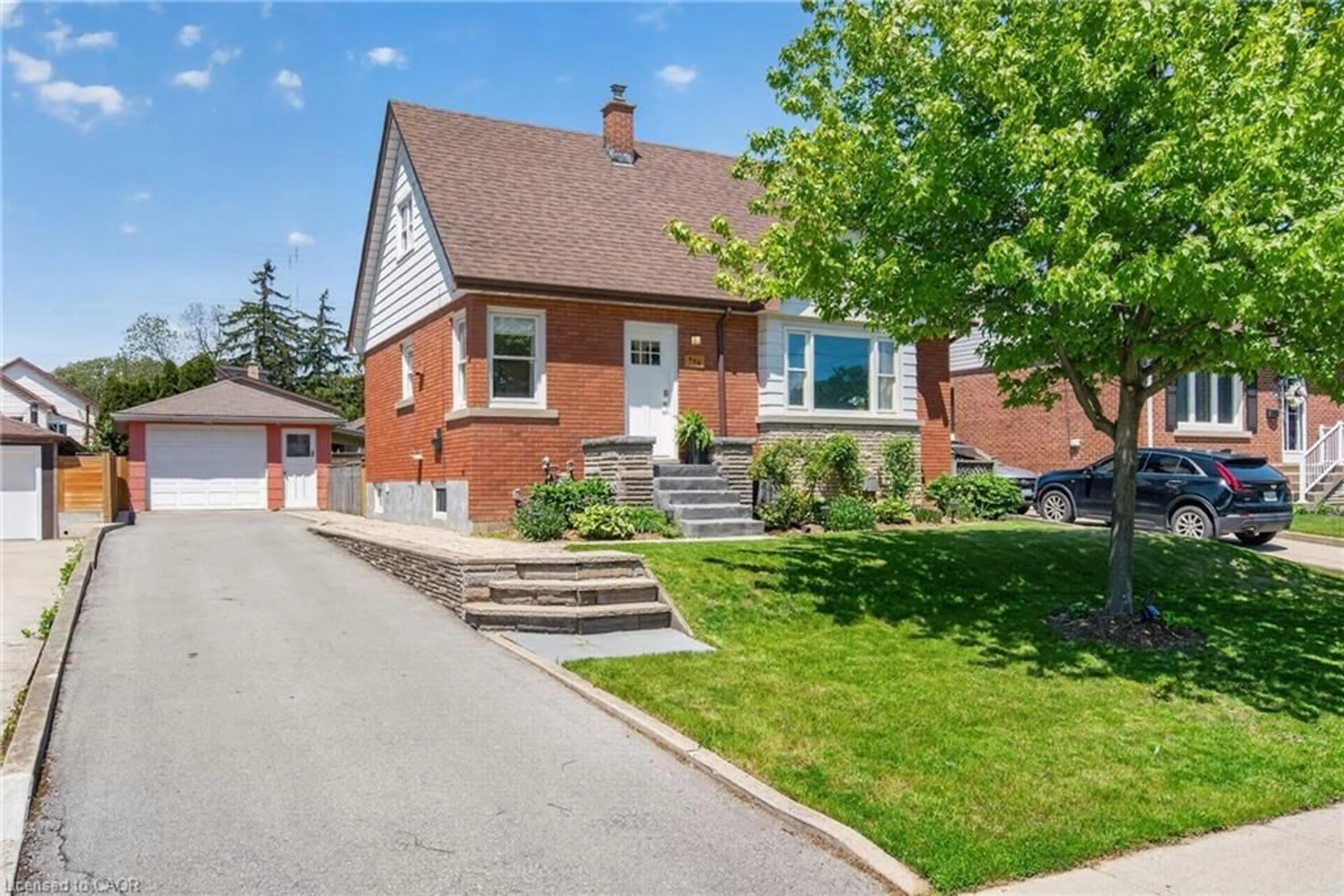 Home with brick exterior material, street for 496 Rosseau Rd, Hamilton Ontario L8K 4T5