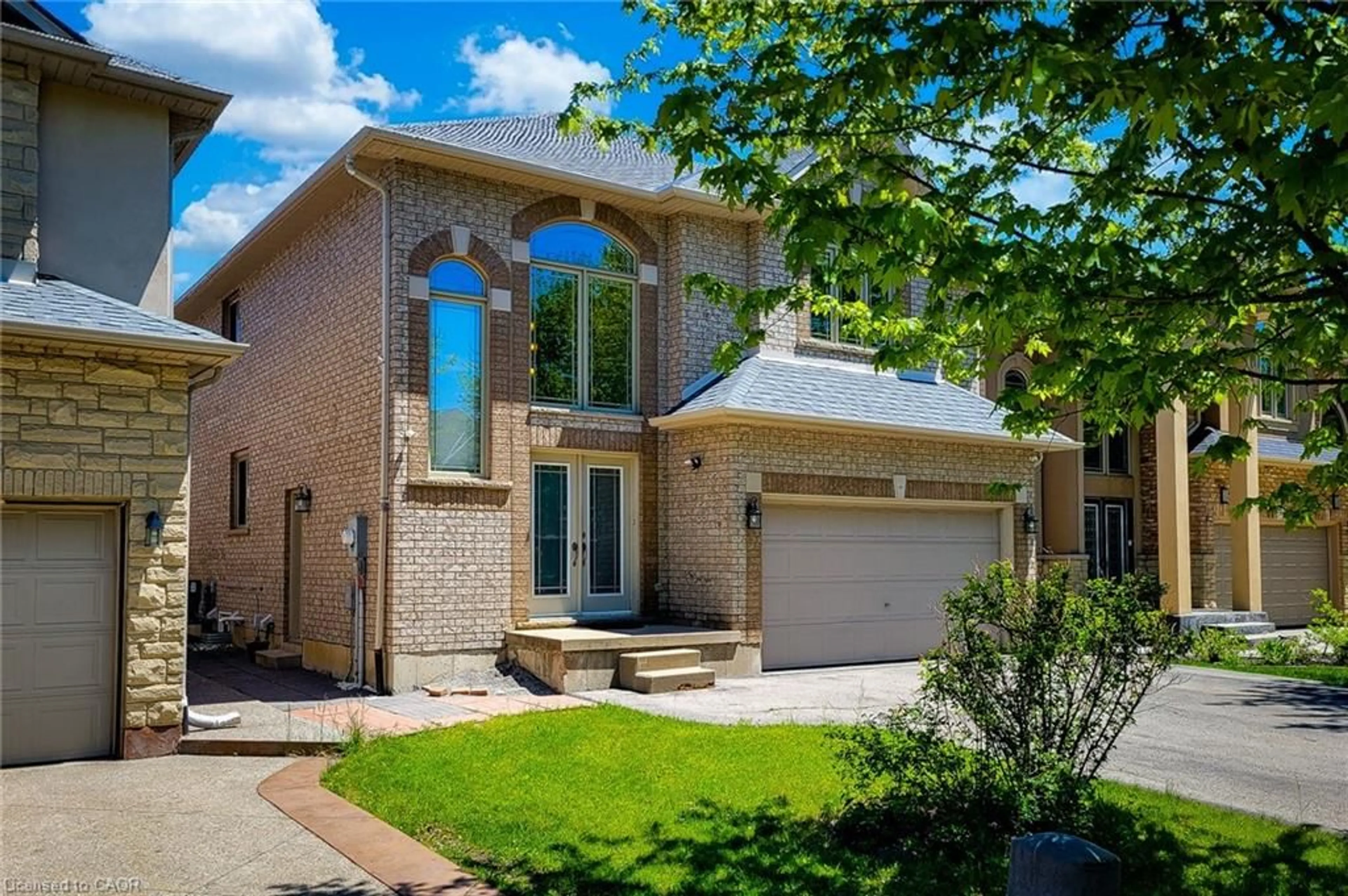 Home with brick exterior material, street for 197 Cloverleaf Dr, Ancaster Ontario L9K 1T4