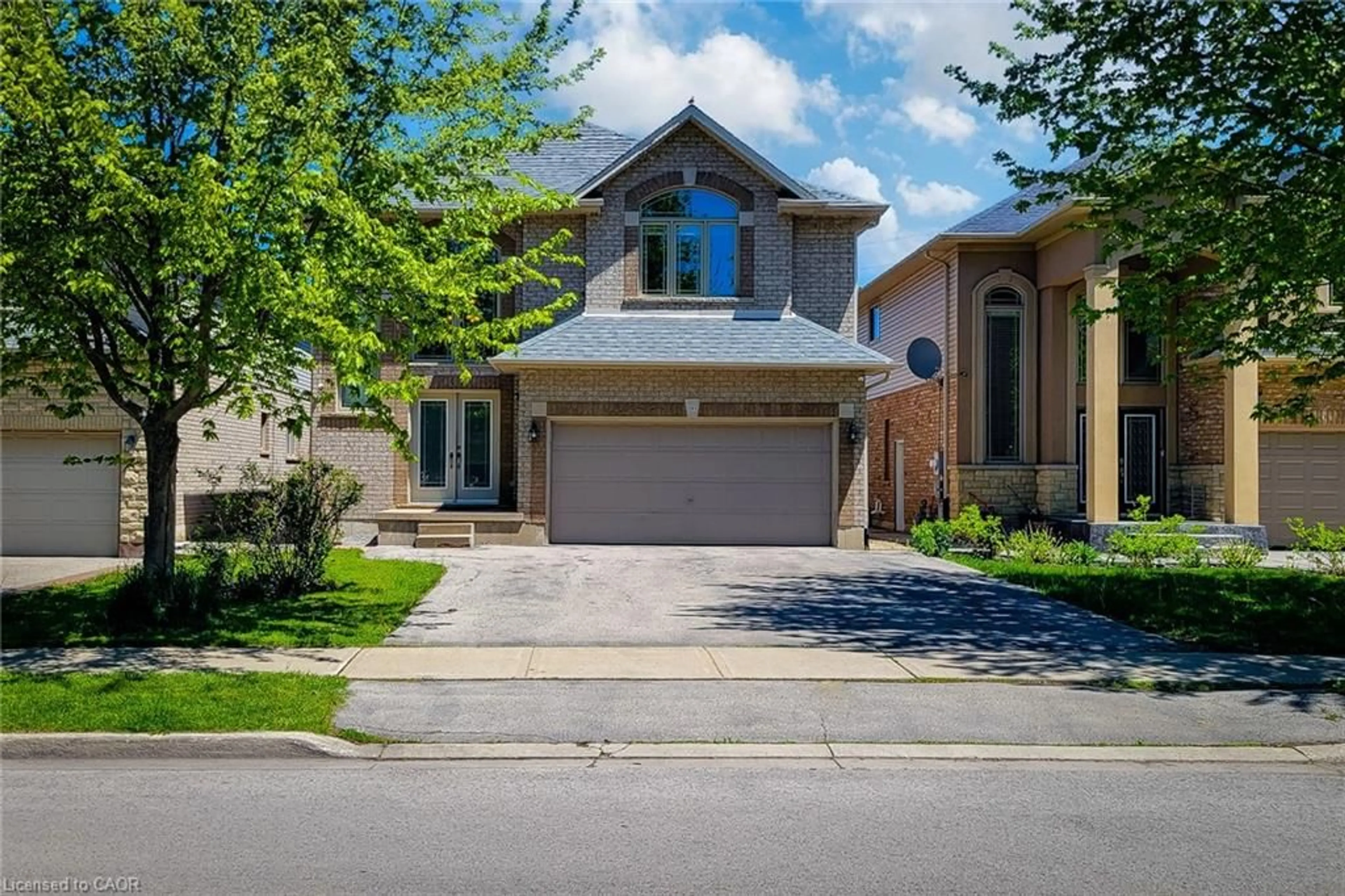 Home with brick exterior material, street for 197 Cloverleaf Dr, Ancaster Ontario L9K 1T4