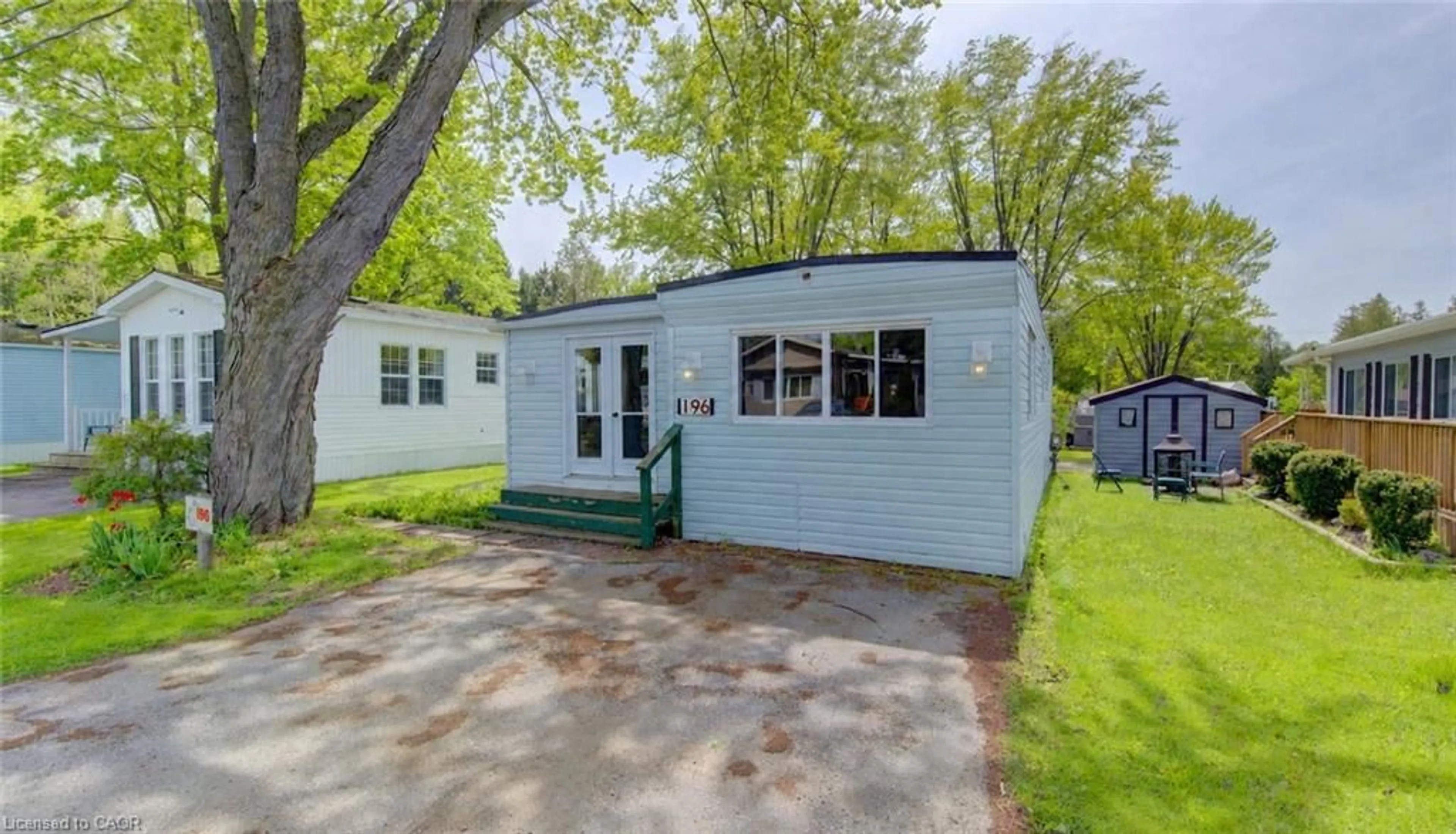 Home with vinyl exterior material, street for 580 Beaver Creek Rd #196, Waterloo Ontario N2J 3Z4