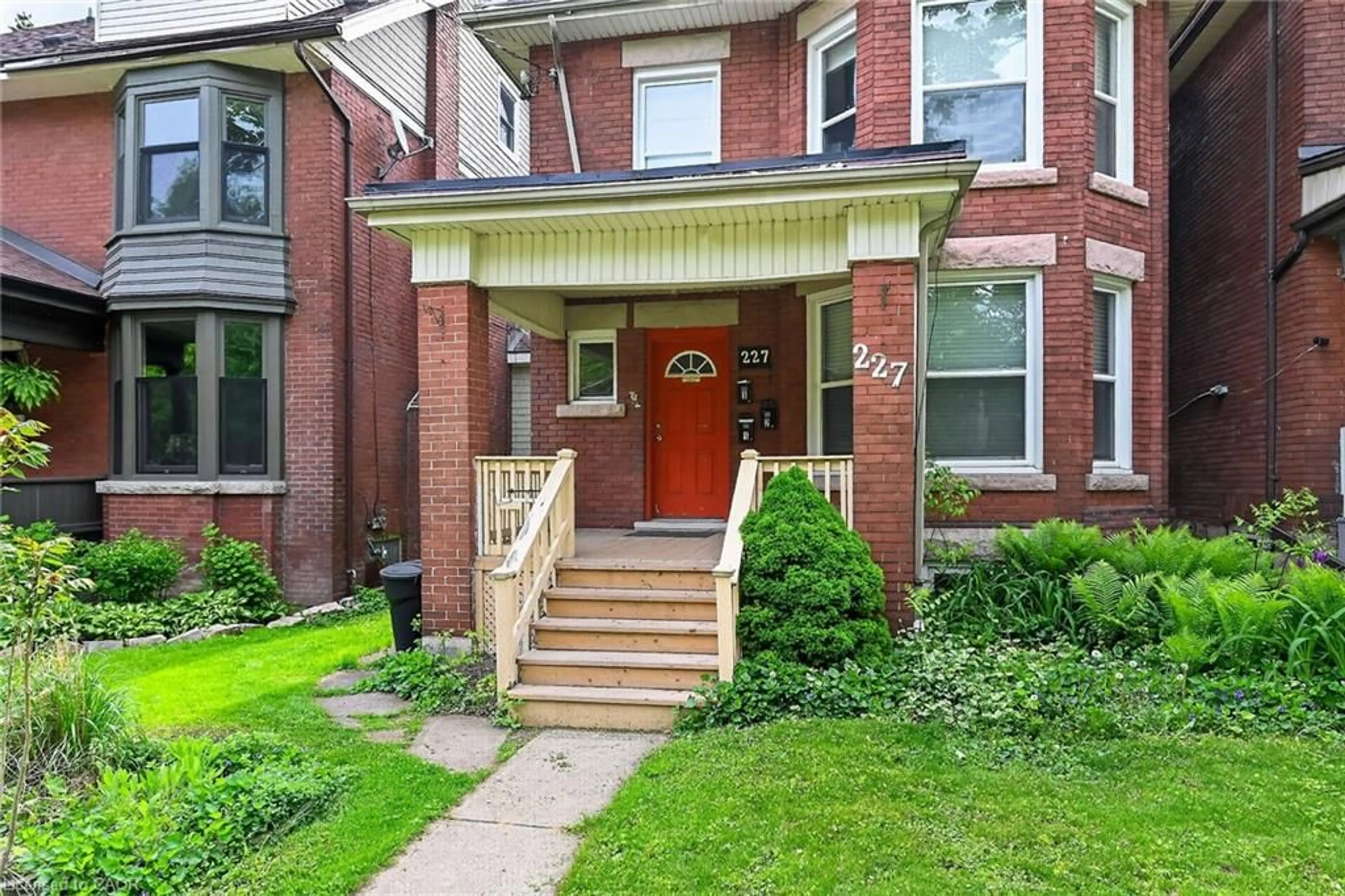Home with brick exterior material, street for 227 Sherman Ave, Hamilton Ontario L8M 2R2
