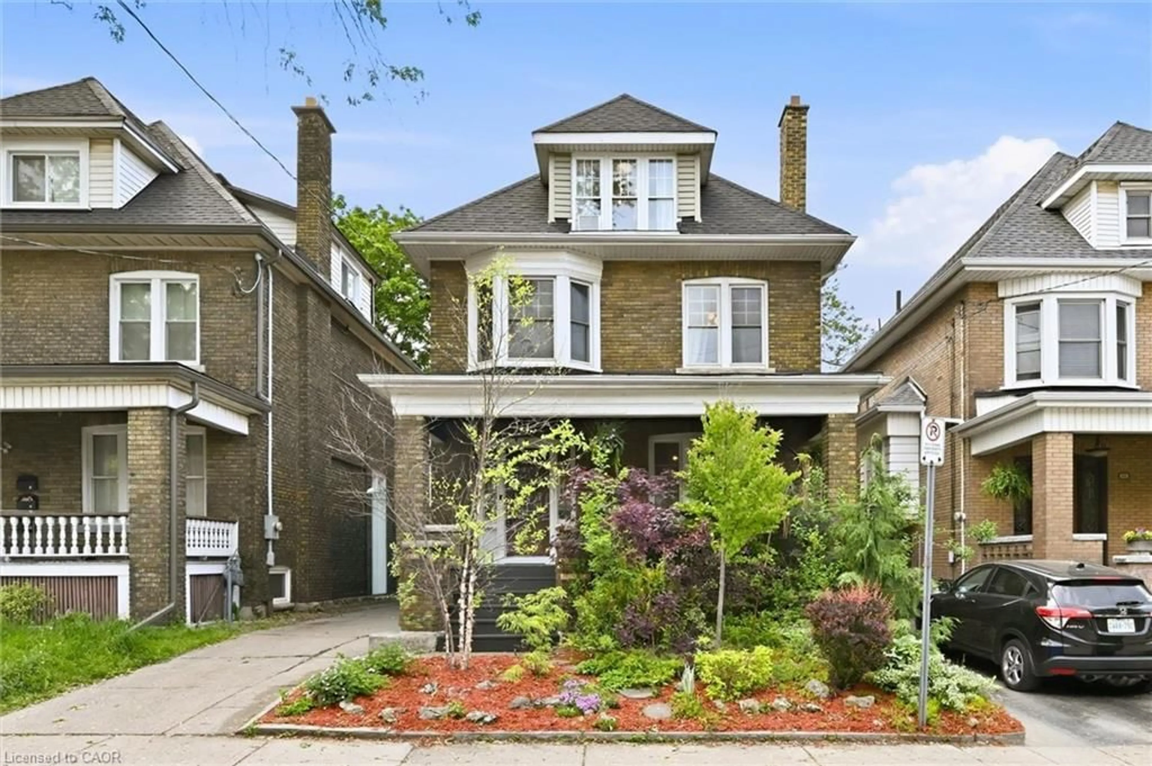 Home with brick exterior material, street for 102 Carrick Ave, Hamilton Ontario L8M 2W6