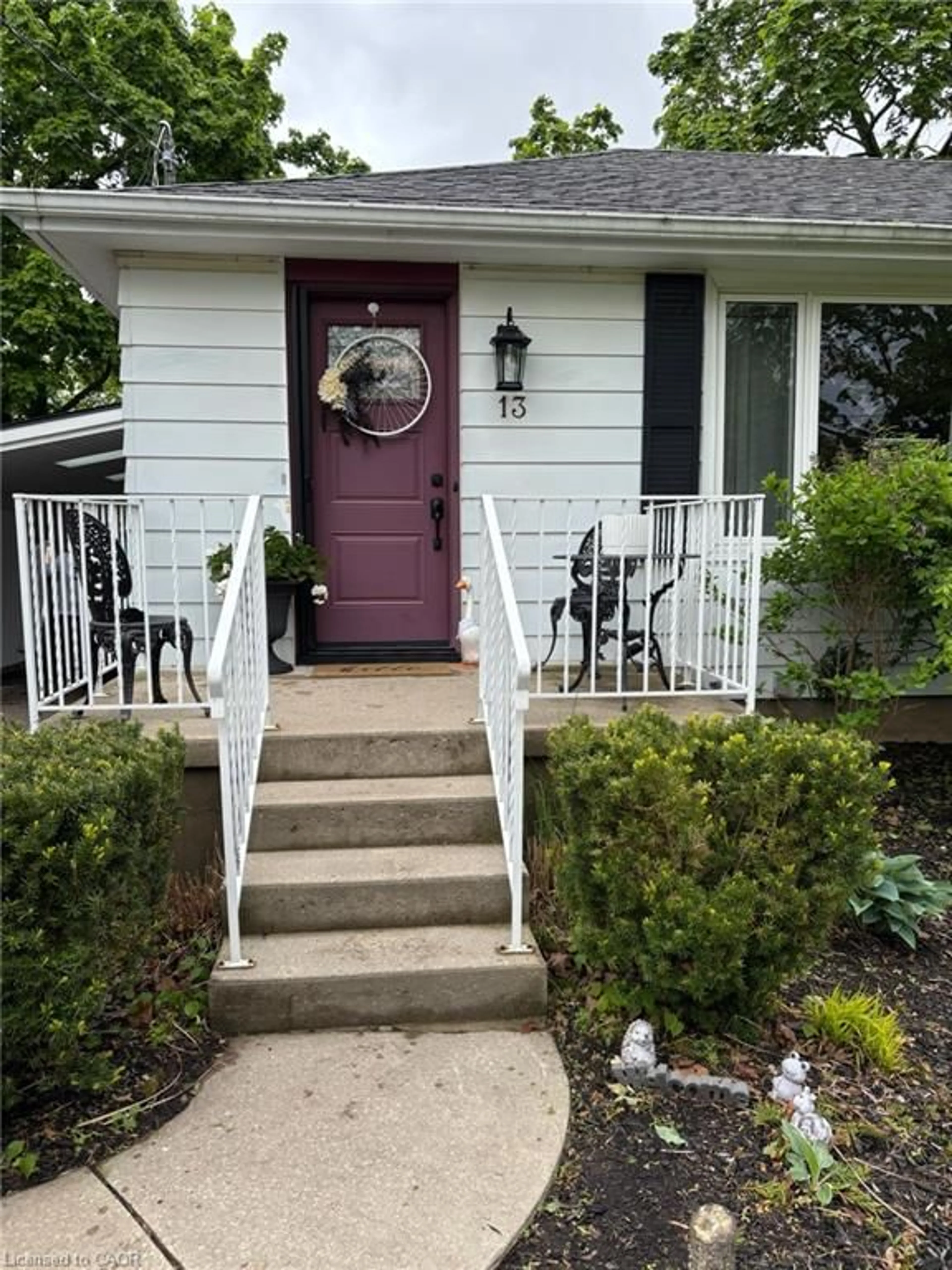 Home with vinyl exterior material, street for 13 Carolina Dr, Brantford Ontario N3R 1X6