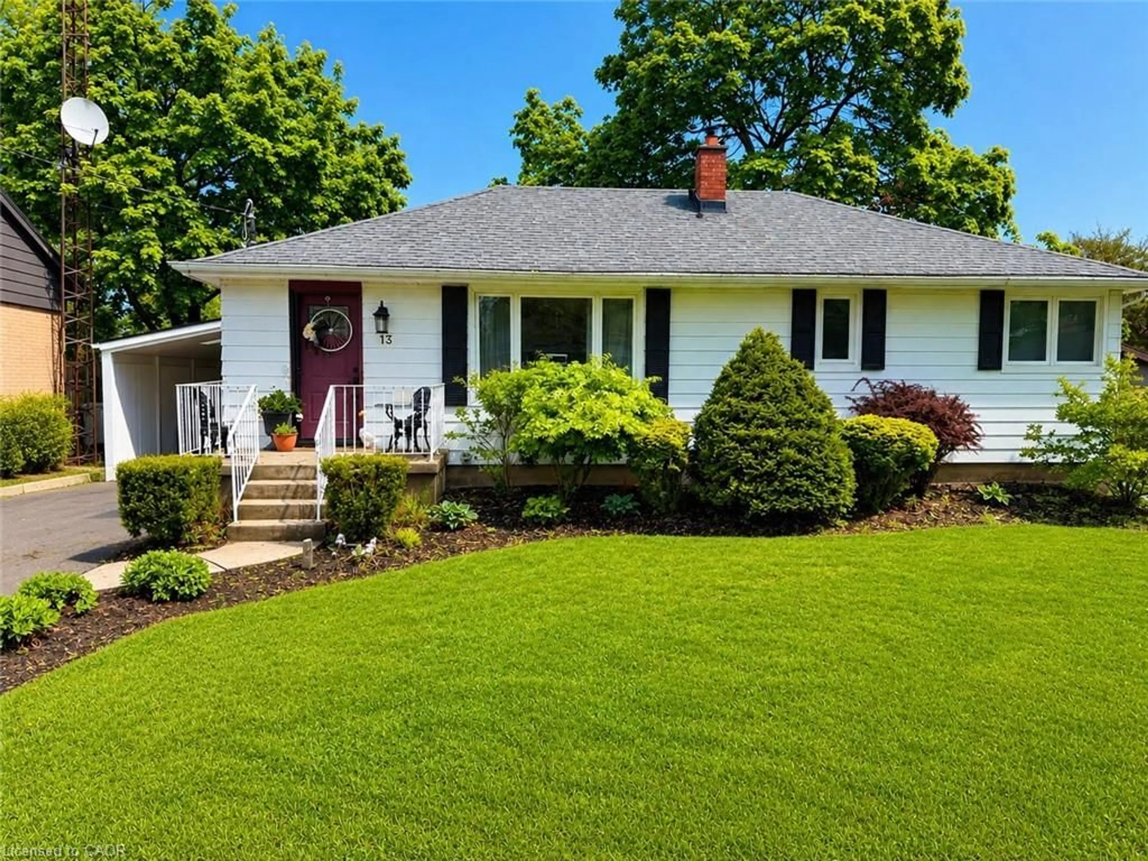 Home with vinyl exterior material, street for 13 Carolina Dr, Brantford Ontario N3R 1X6