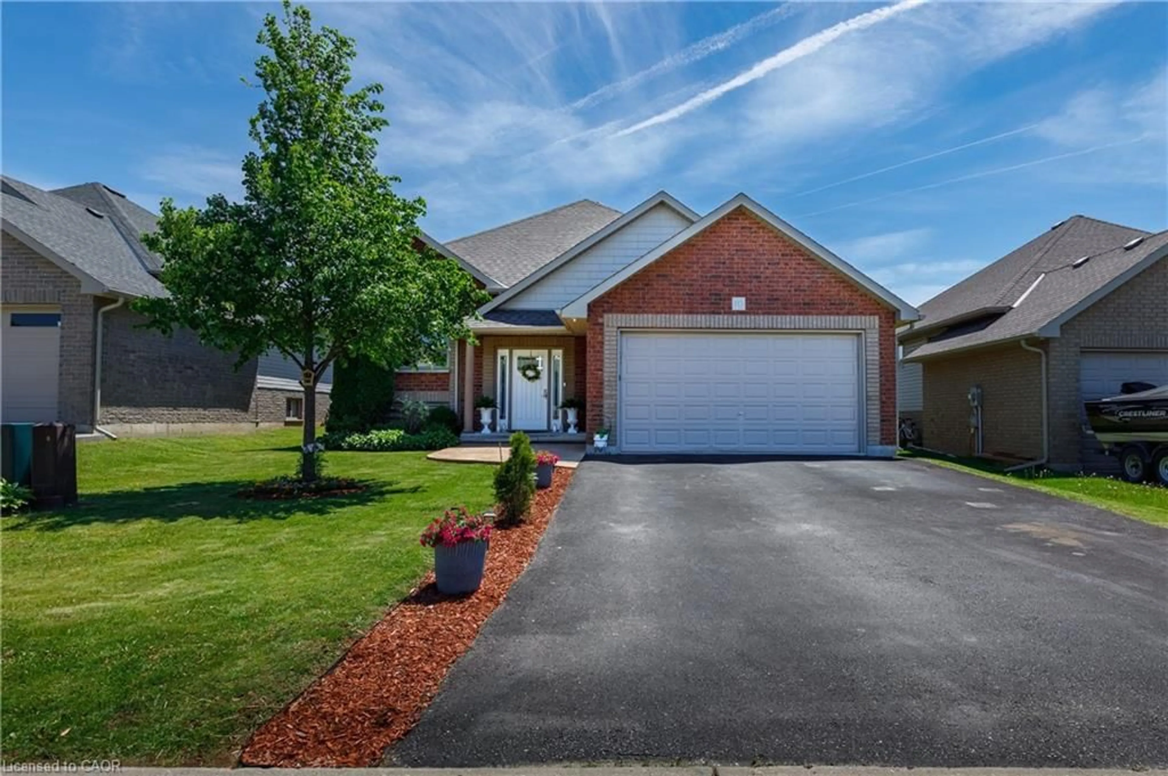 Home with brick exterior material, street for 10 Redbud Cres, Simcoe Ontario N3Y 0B7