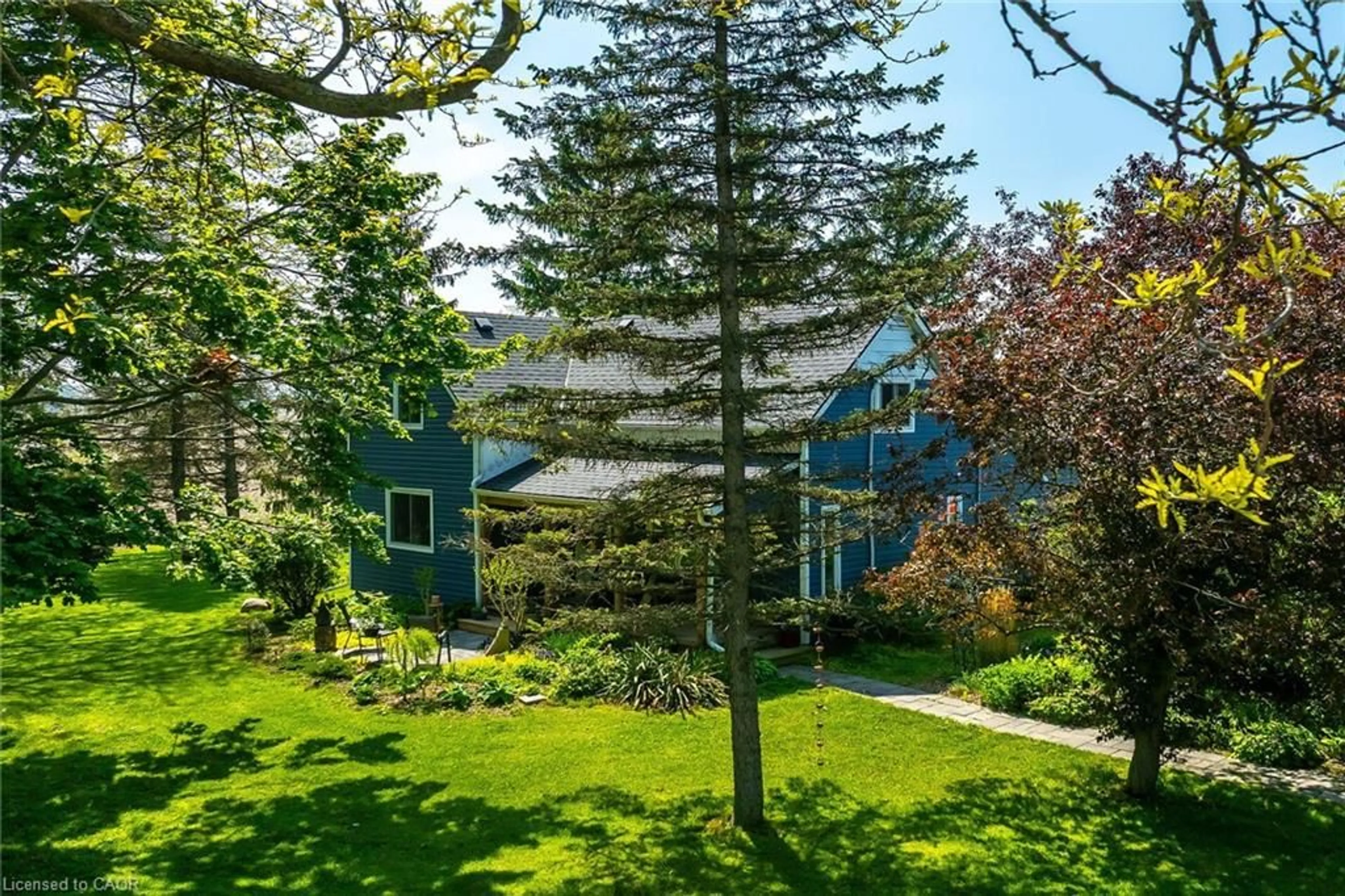 A pic from outside/outdoor area/front of a property/back of a property/a pic from drone, forest/trees view for 393 Marshagan Rd, Dunnville Ontario N1A 2W2