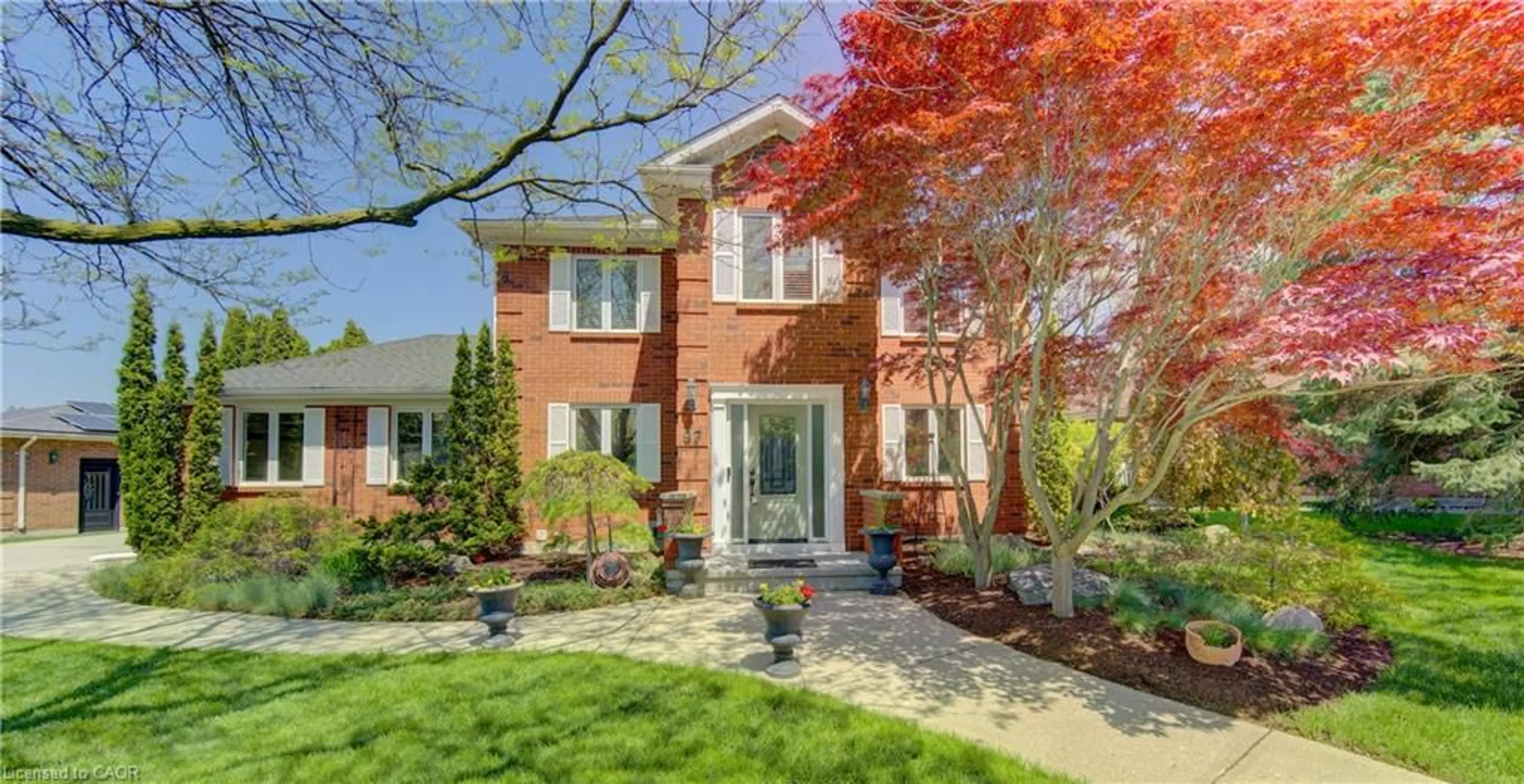 Home with brick exterior material, street for 97 Manitoulin Cres, Kitchener Ontario N2A 3H5