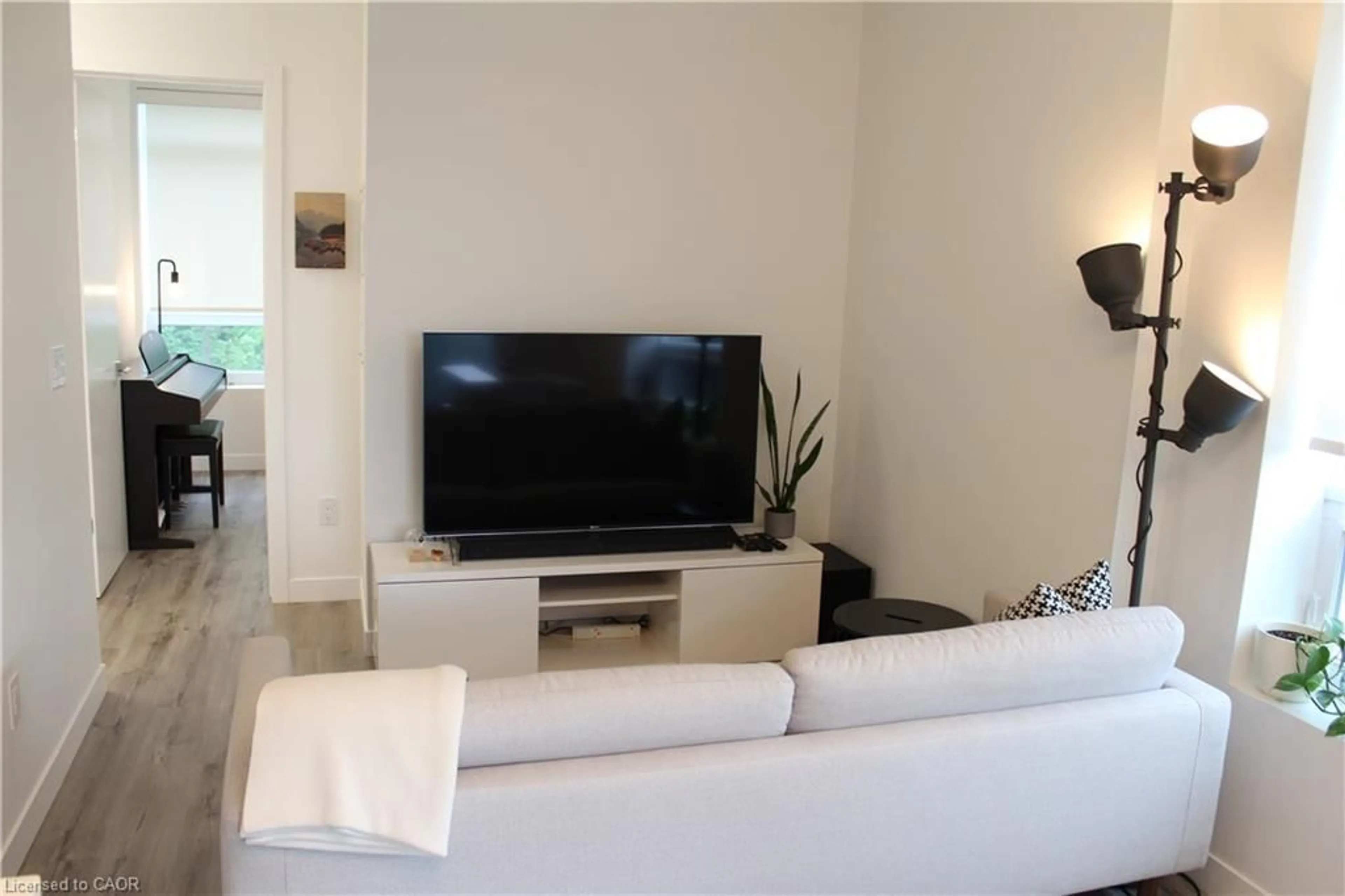 Living room with furniture, unknown for 479 Charlton Ave #308, Hamilton Ontario L8N 0B4