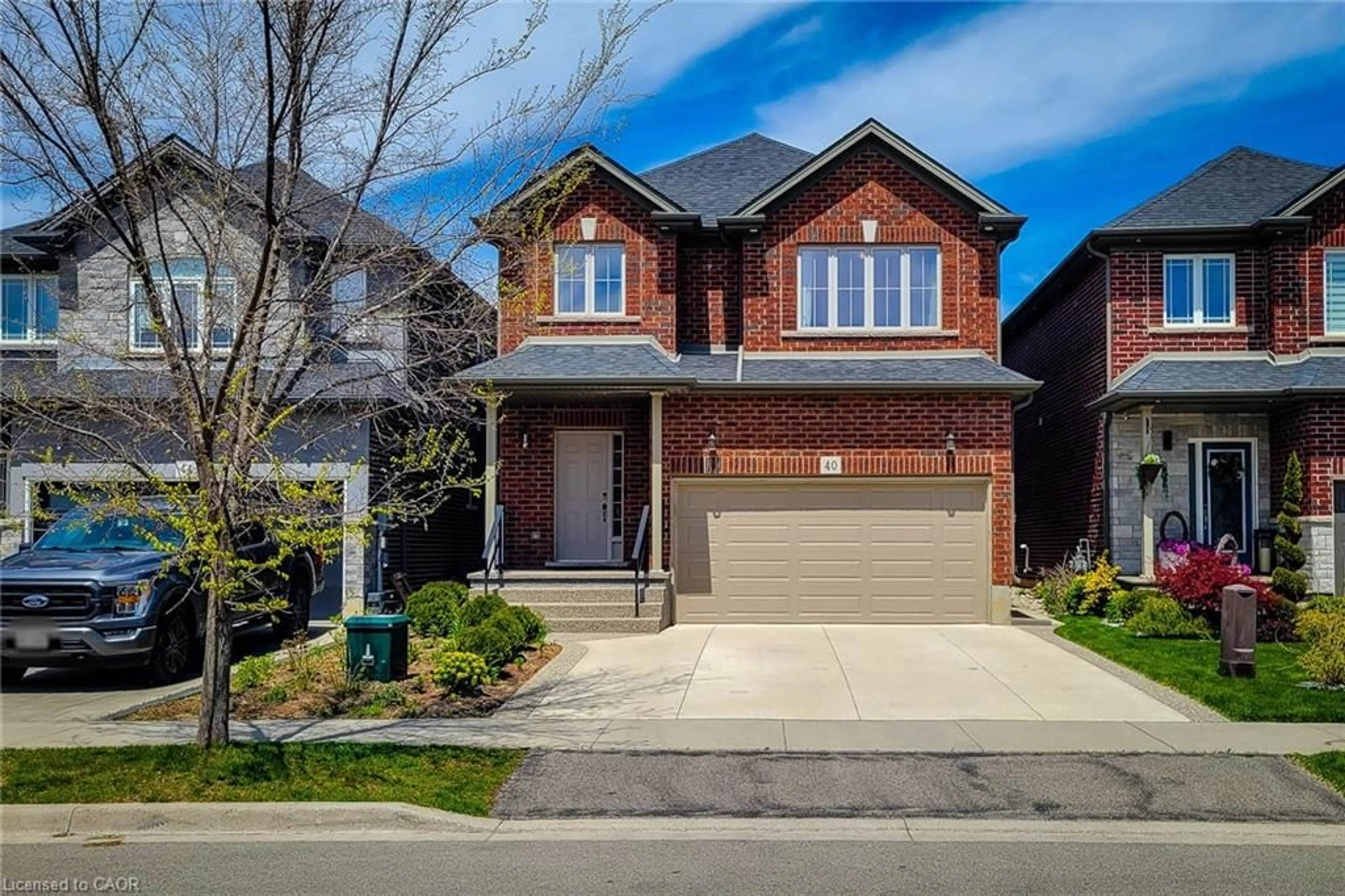 Home with brick exterior material, street for 40 Fairgrounds Dr, Binbrook Ontario L0R 1C0