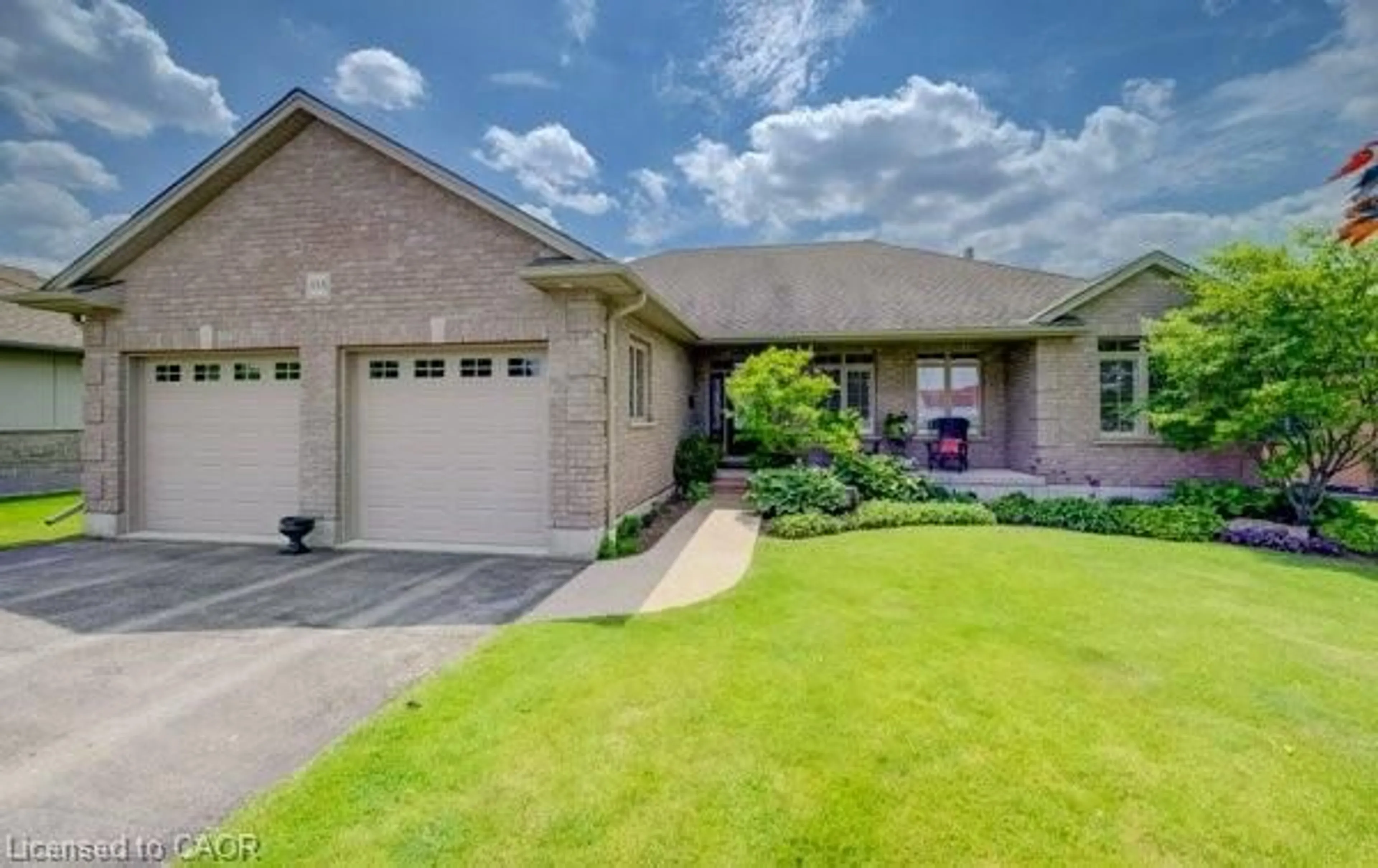 Home with brick exterior material, street for 355 Woodstock St, Tavistock Ontario N0B 2R0