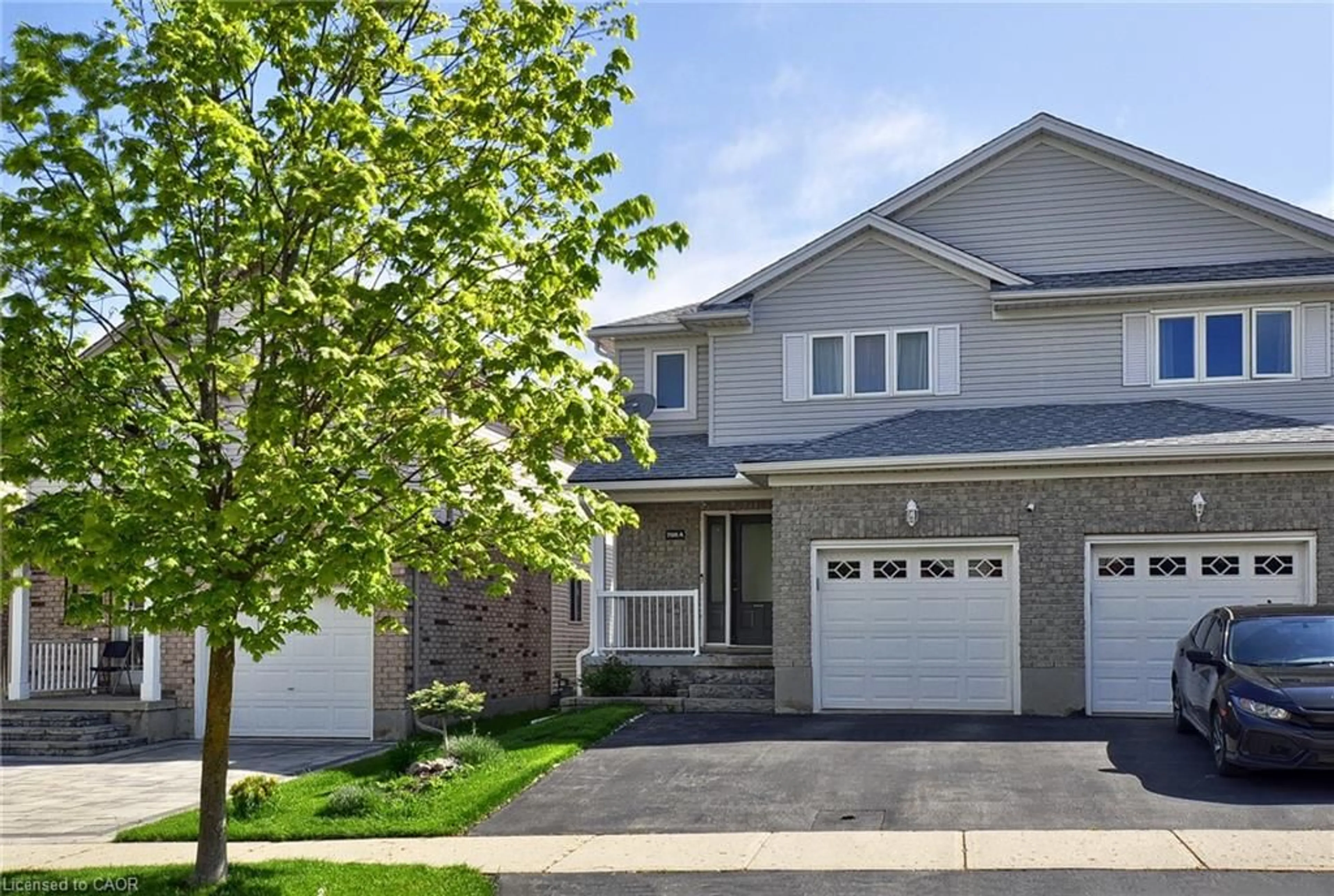 Home with vinyl exterior material, street for 708A Karlsfeld Rd, Waterloo Ontario N2T 2W4