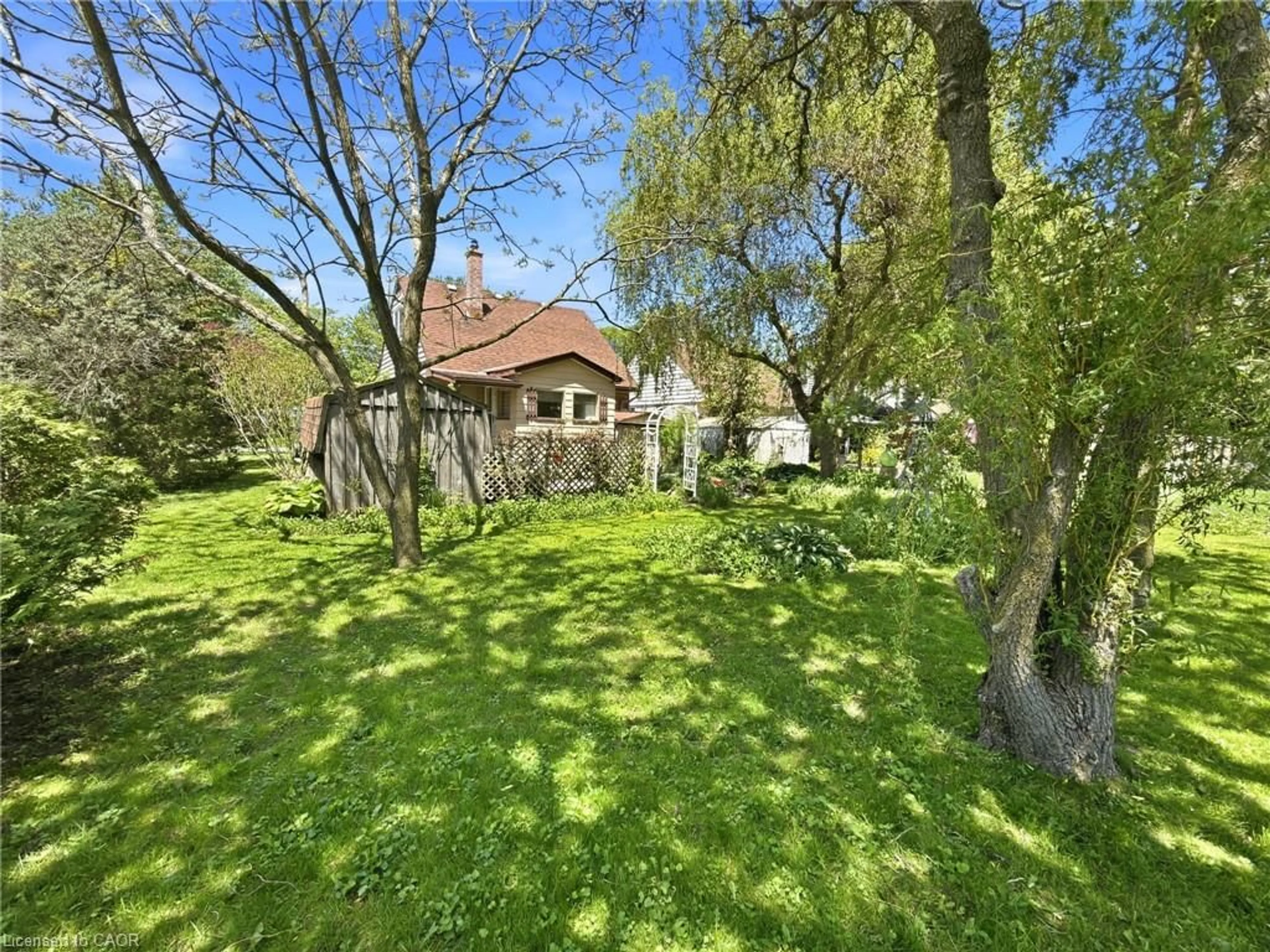 A pic from outside/outdoor area/front of a property/back of a property/a pic from drone, forest/trees view for 189 Brydges St, Stratford Ontario N5A 1S2