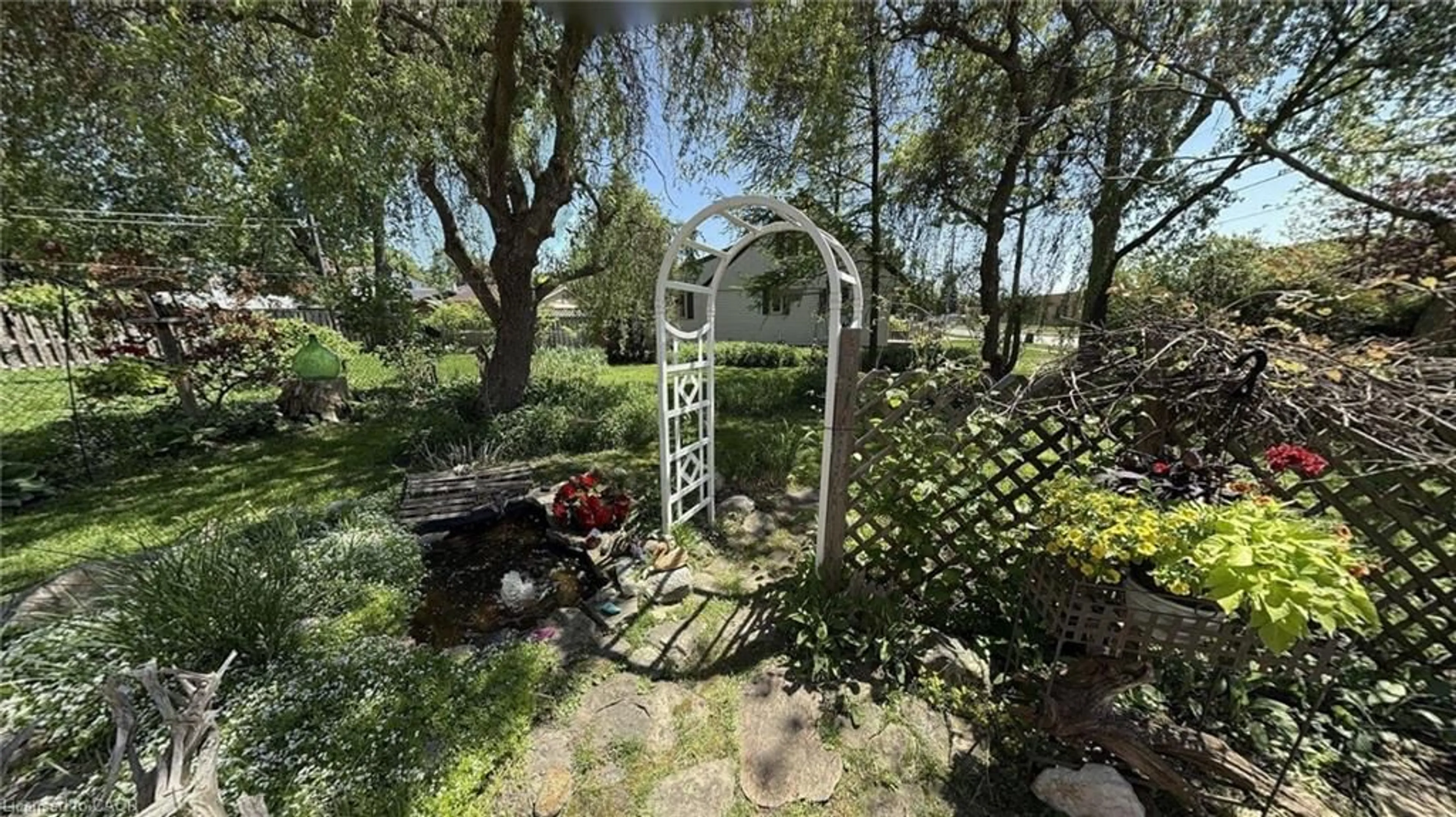 A pic from outside/outdoor area/front of a property/back of a property/a pic from drone, forest/trees view for 189 Brydges St, Stratford Ontario N5A 1S2