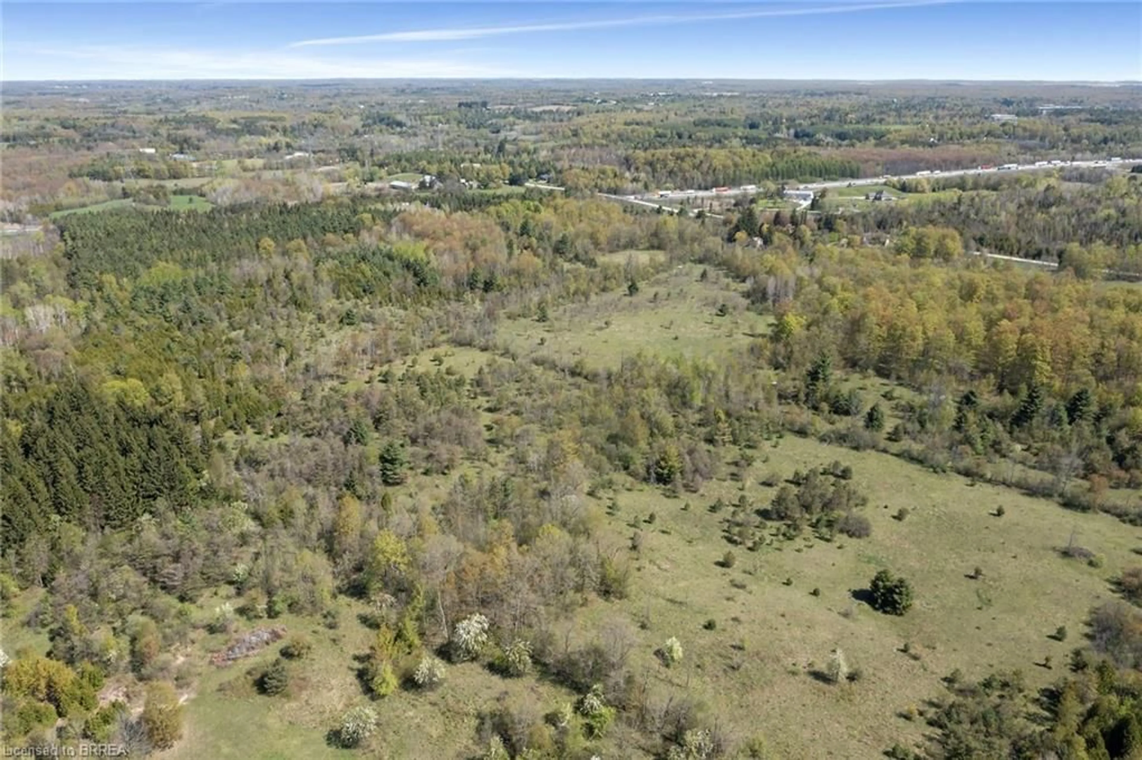 A pic from outside/outdoor area/front of a property/back of a property/a pic from drone, forest/trees view for 9414 First Line Nassagaweya, Milton Ontario L0P 1J0