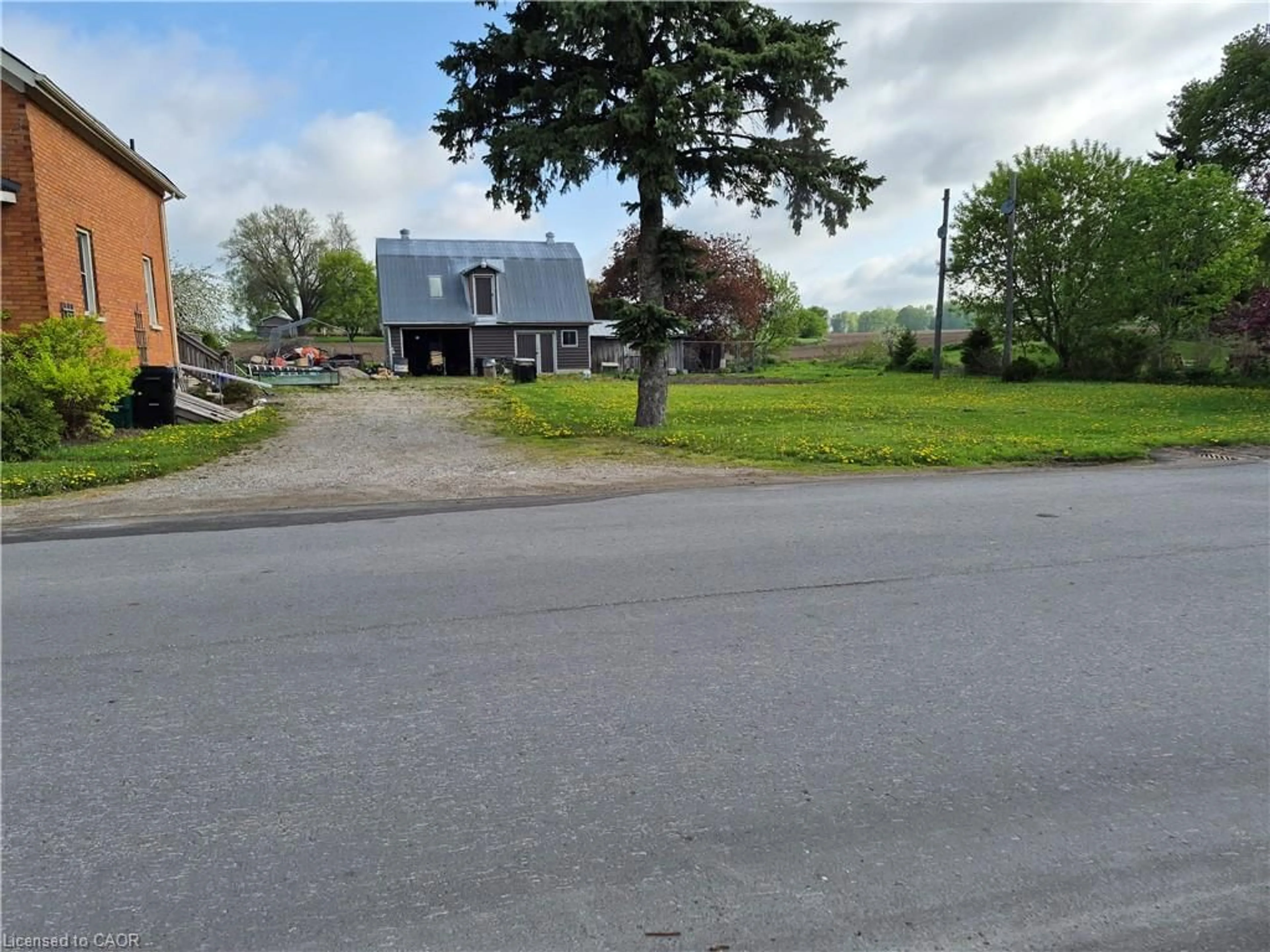 A pic from outside/outdoor area/front of a property/back of a property/a pic from drone, street for 9 Florapine Rd, Floradale Ontario N0B 1V0