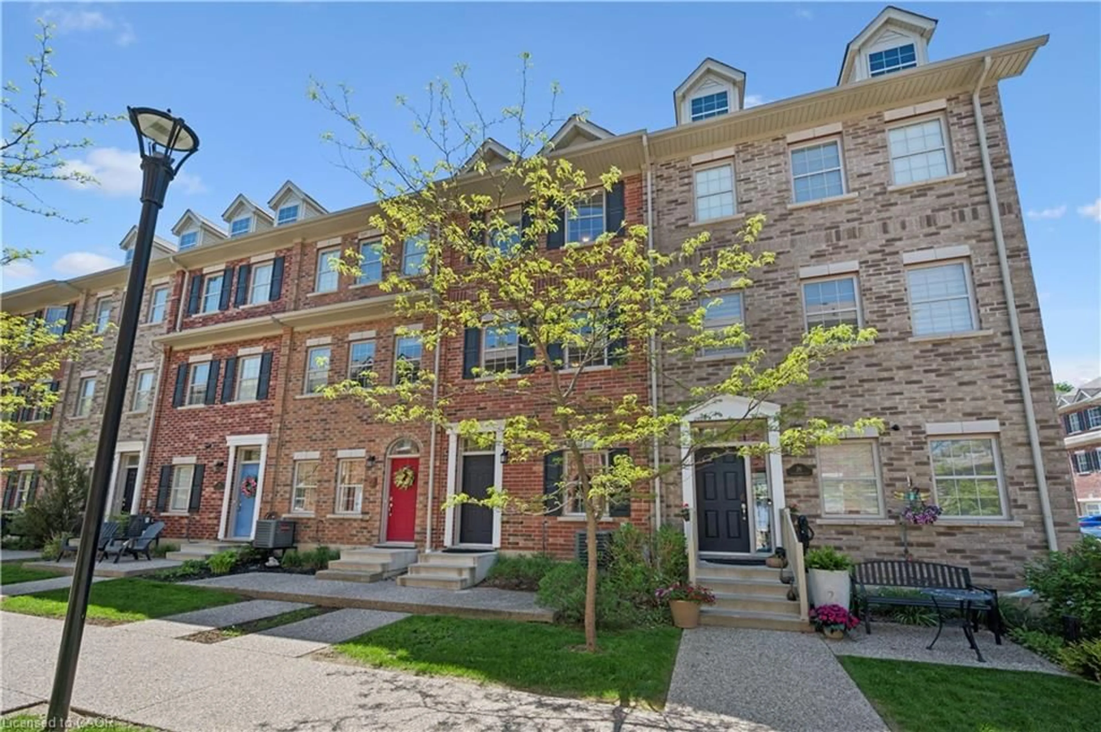 Home with brick exterior material, street for 24 Oxfordshire Lane, Kitchener Ontario N2H 0B5