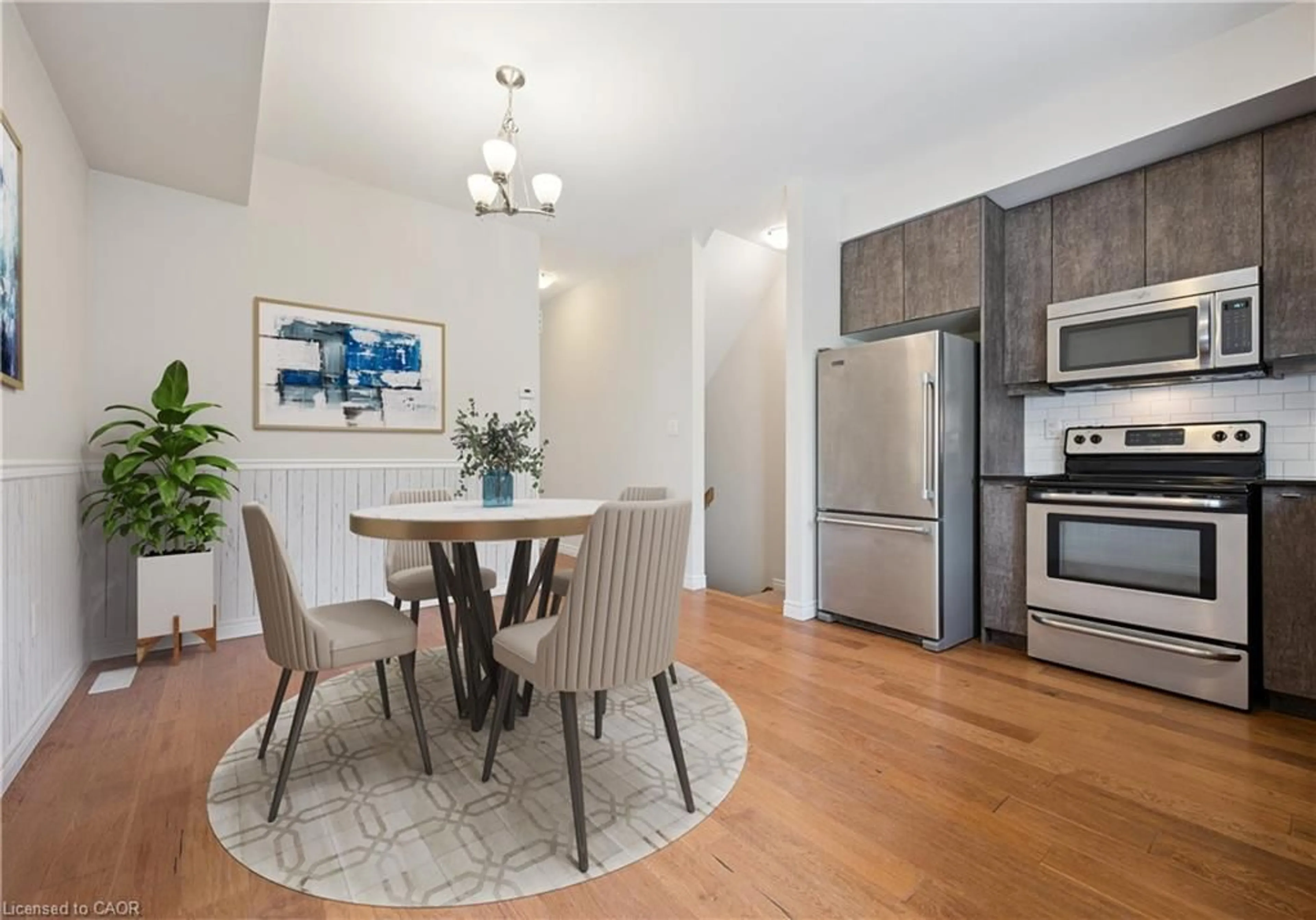 Open concept kitchen, wood/laminate floor for 24 Oxfordshire Lane, Kitchener Ontario N2H 0B5
